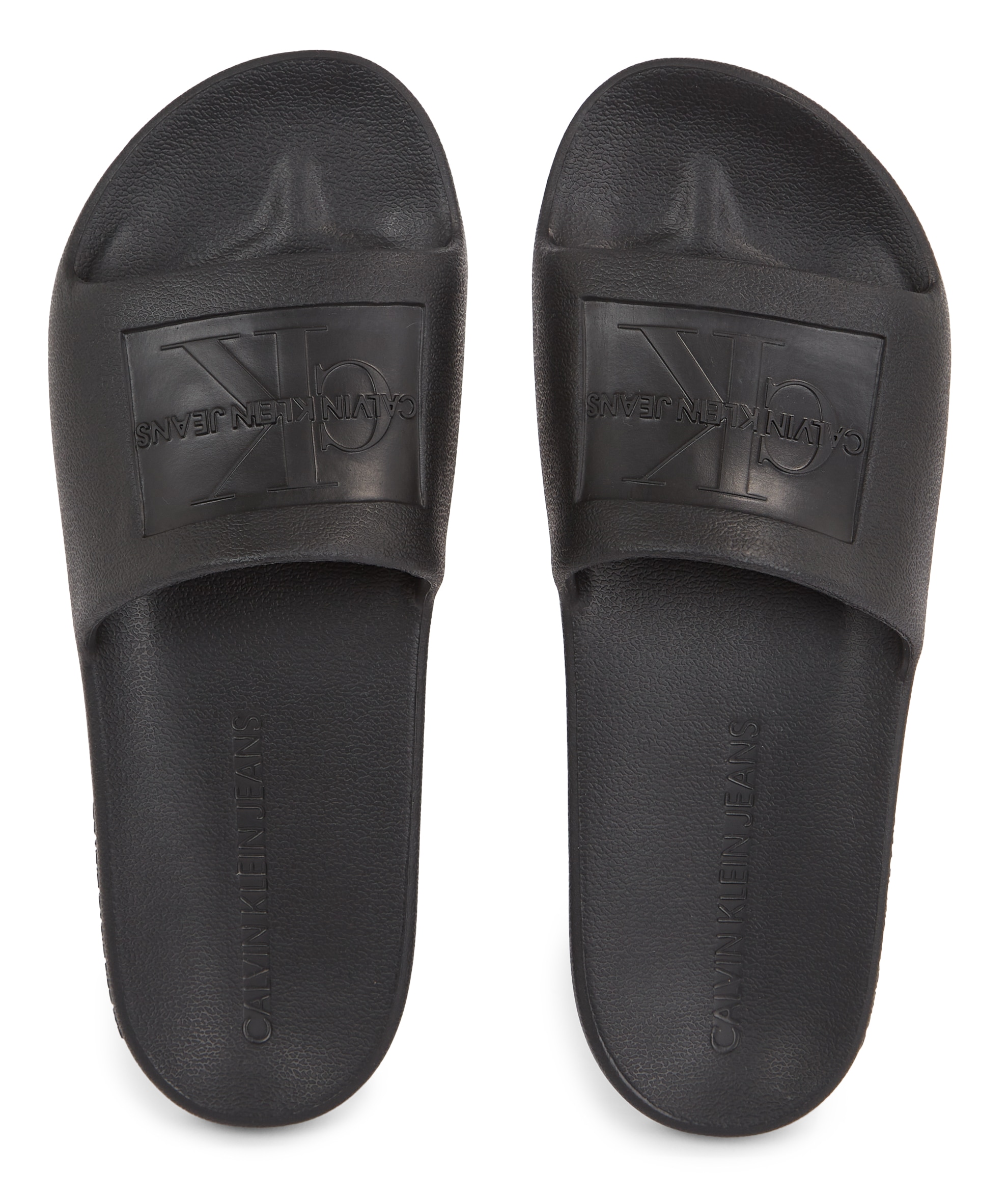 Calvin Klein Jeans Badepantolette »SLIDE MONOGRAM DEBOSSED EVA«, Sommerschuh, Poolslides, Schlappen, schmale Form