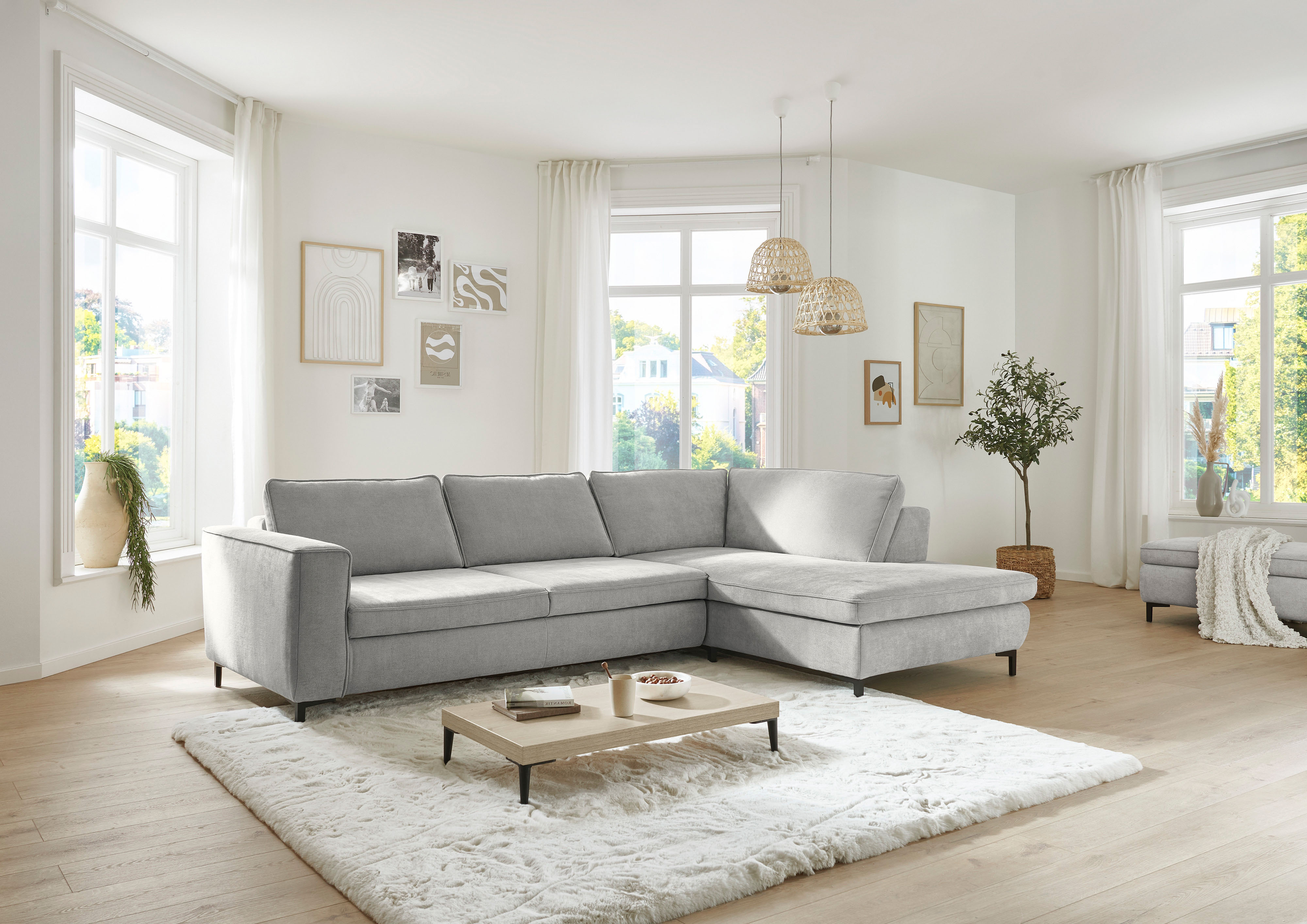 Die PlanBar Ecksofa "MP-IN24153, L-Form, Breite 289 cm" wahlweise mit Schlaffunktion und verstellbaren Kopfstützen