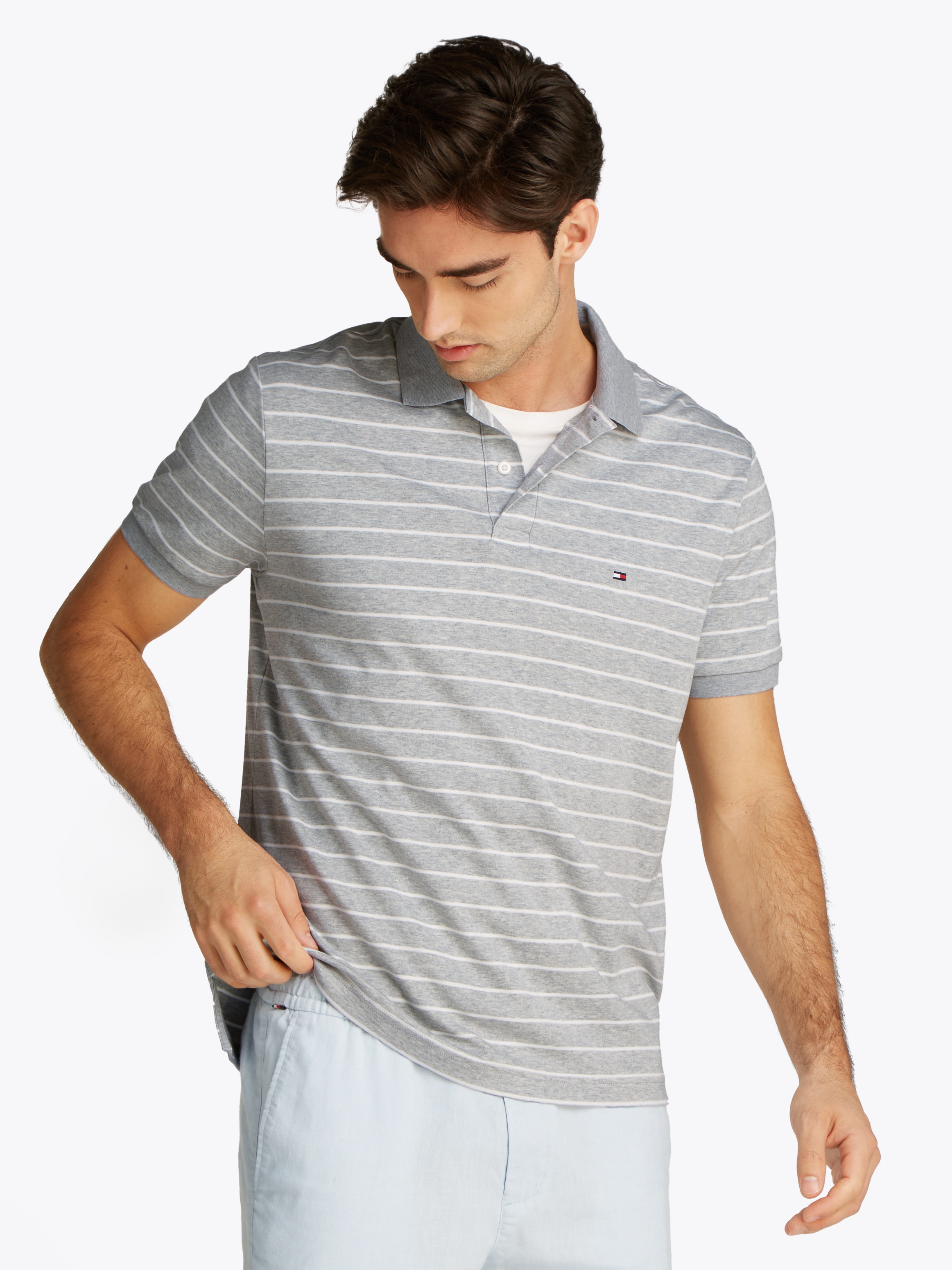 Tommy Hilfiger Poloshirt "LIQUID COTTON REG SEASONAL POLO", mit Logosticker günstig online kaufen