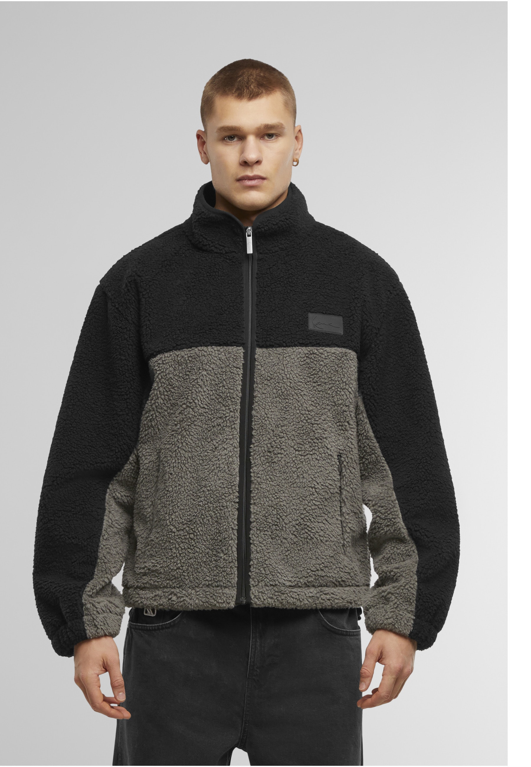 Karl Kani Winterjacke »Karl Kani Signature Rubber Patch Teddy Zip Jacket« 1 Stk. tlg. ohne Kapuze