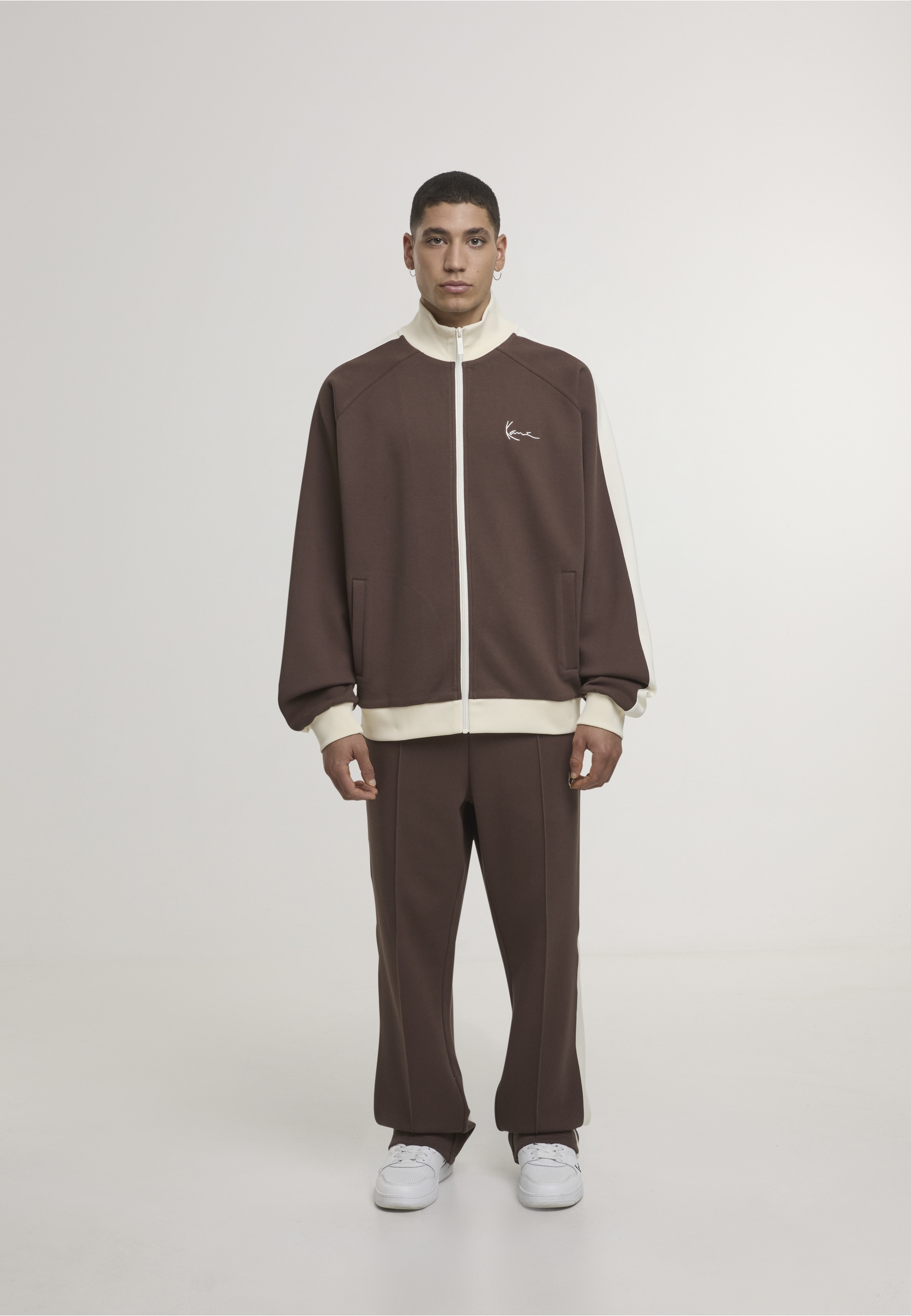 Karl Kani Outdoorjacke »Karl Kani Signature Sidestripe Pique Trackjacket« 1 Stk. tlg. ohne Kapuze