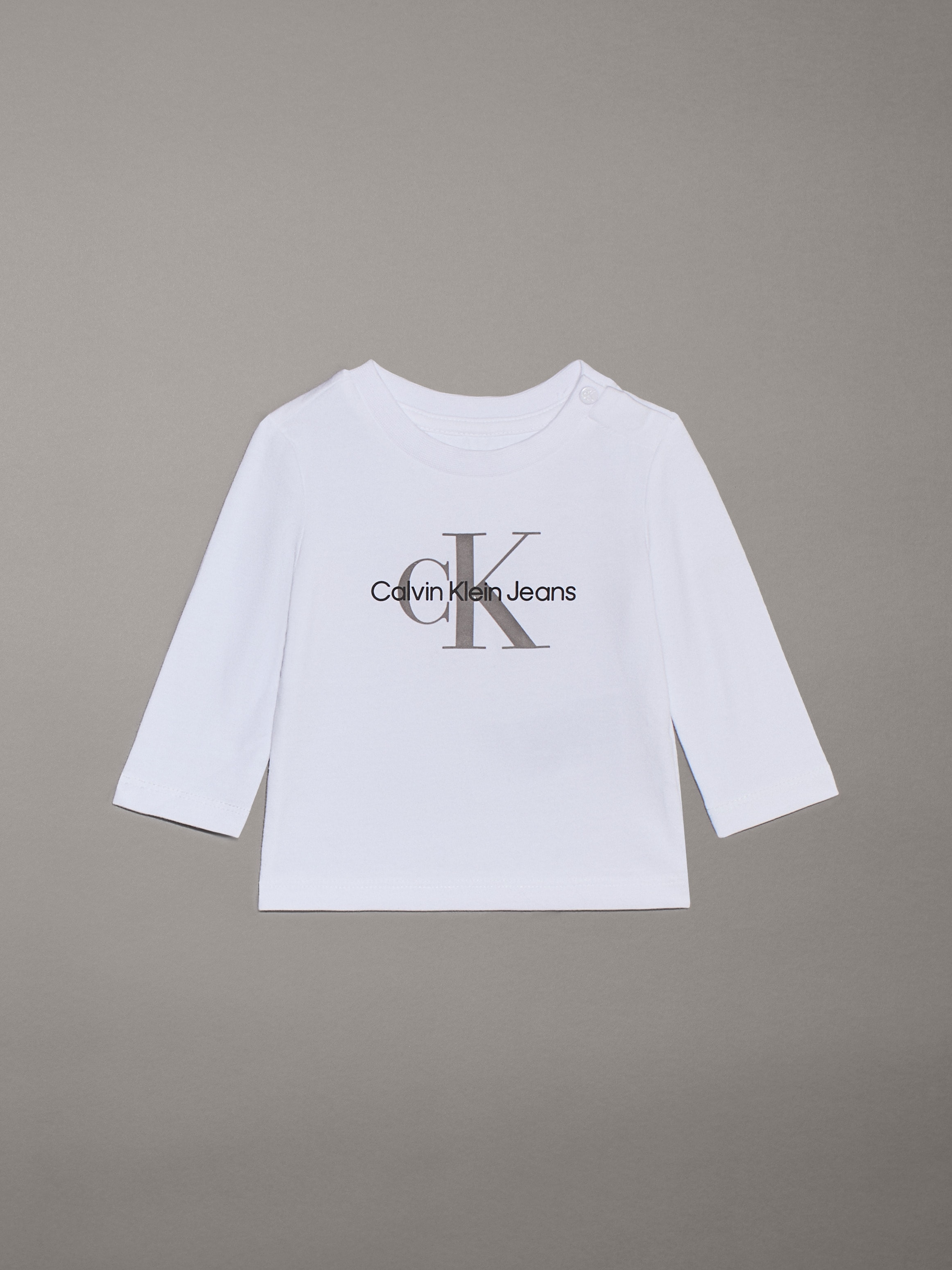 Calvin Klein Jeans Langarmshirt »MONOGRAM LS T-SHIRT«, für Babys bis 2 Jahre, mit großem Druck