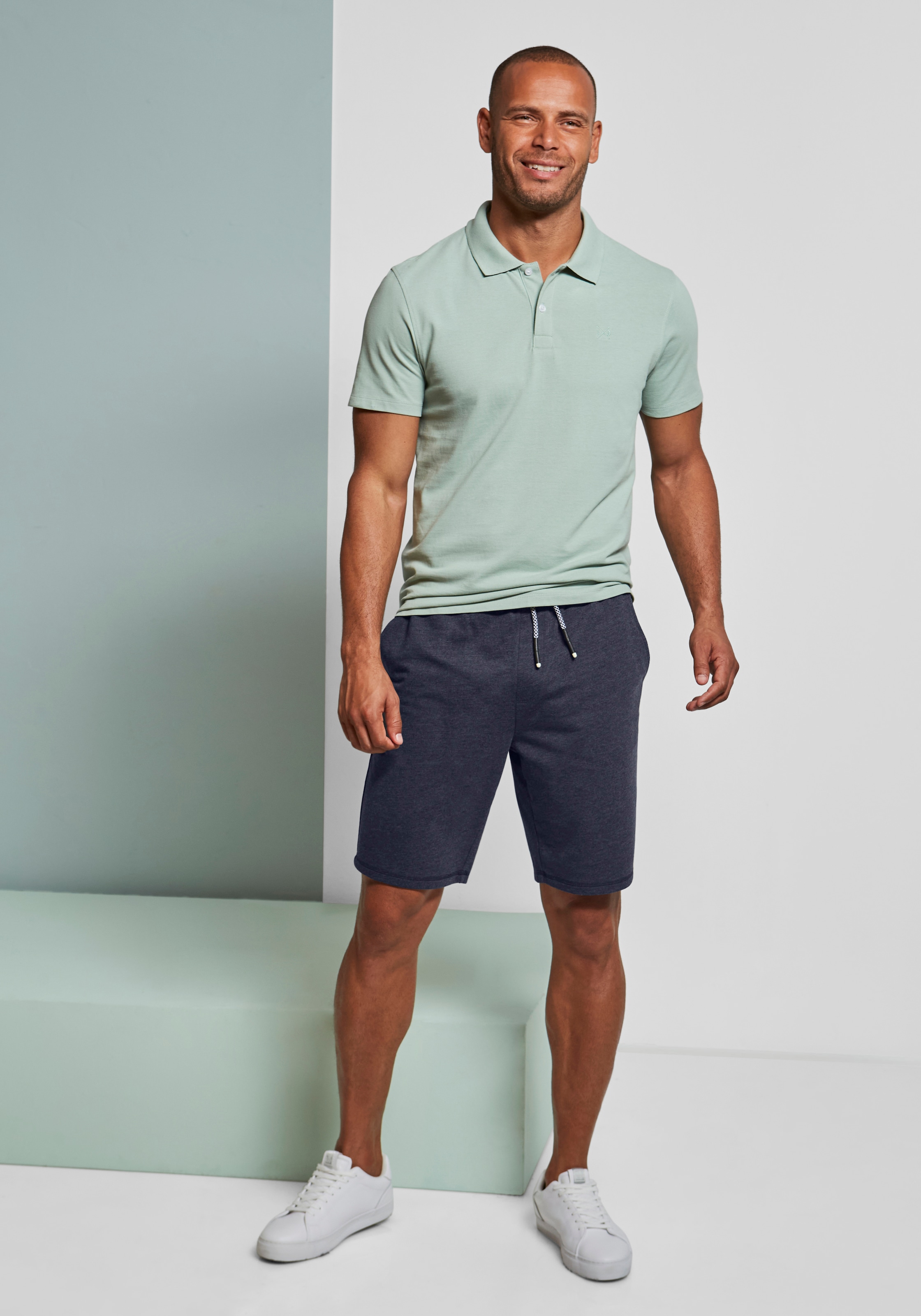John Devin Sweatshorts »weit geschnitten«, in Melange-Optik aus Baumwoll-Mix