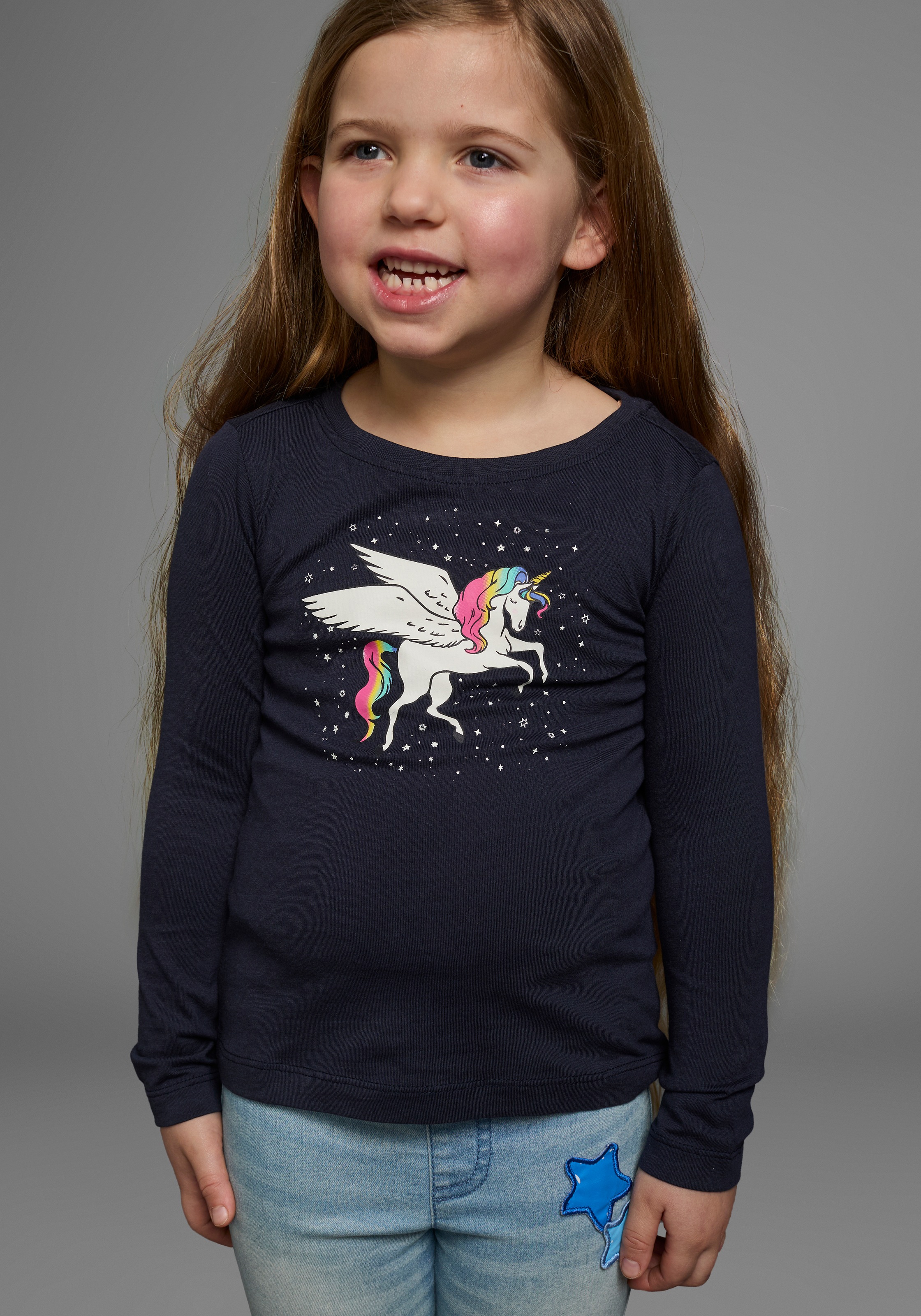 KIDSWORLD Langarmshirt "mit süßem Einhorn Druck" langärmlig, hüftlange Passform, stylischer Druck