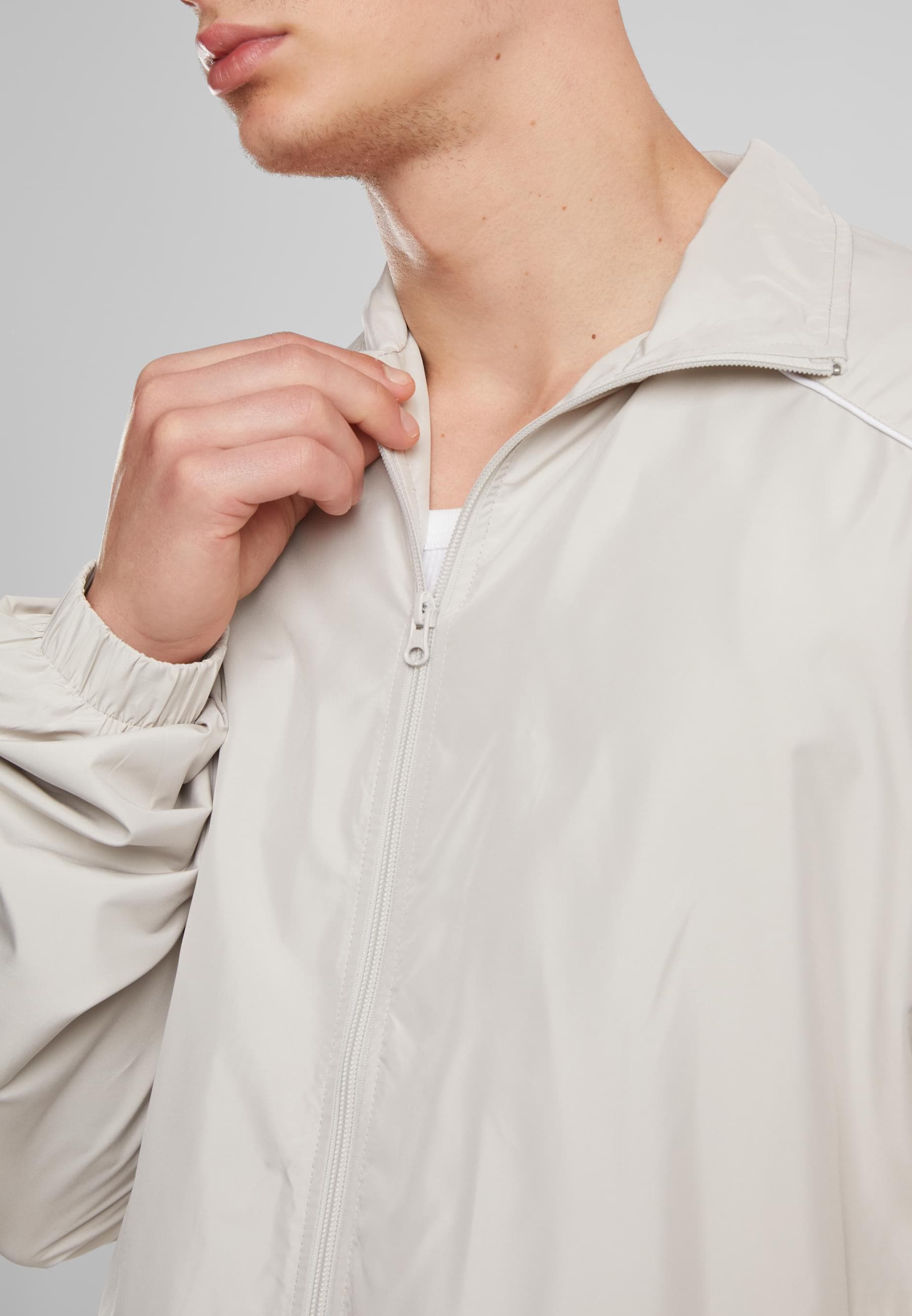 URBAN CLASSICS Trainingsjacke »Urban Classics Piped Panel Trackjacket«, (1 St.), ohne Kapuze