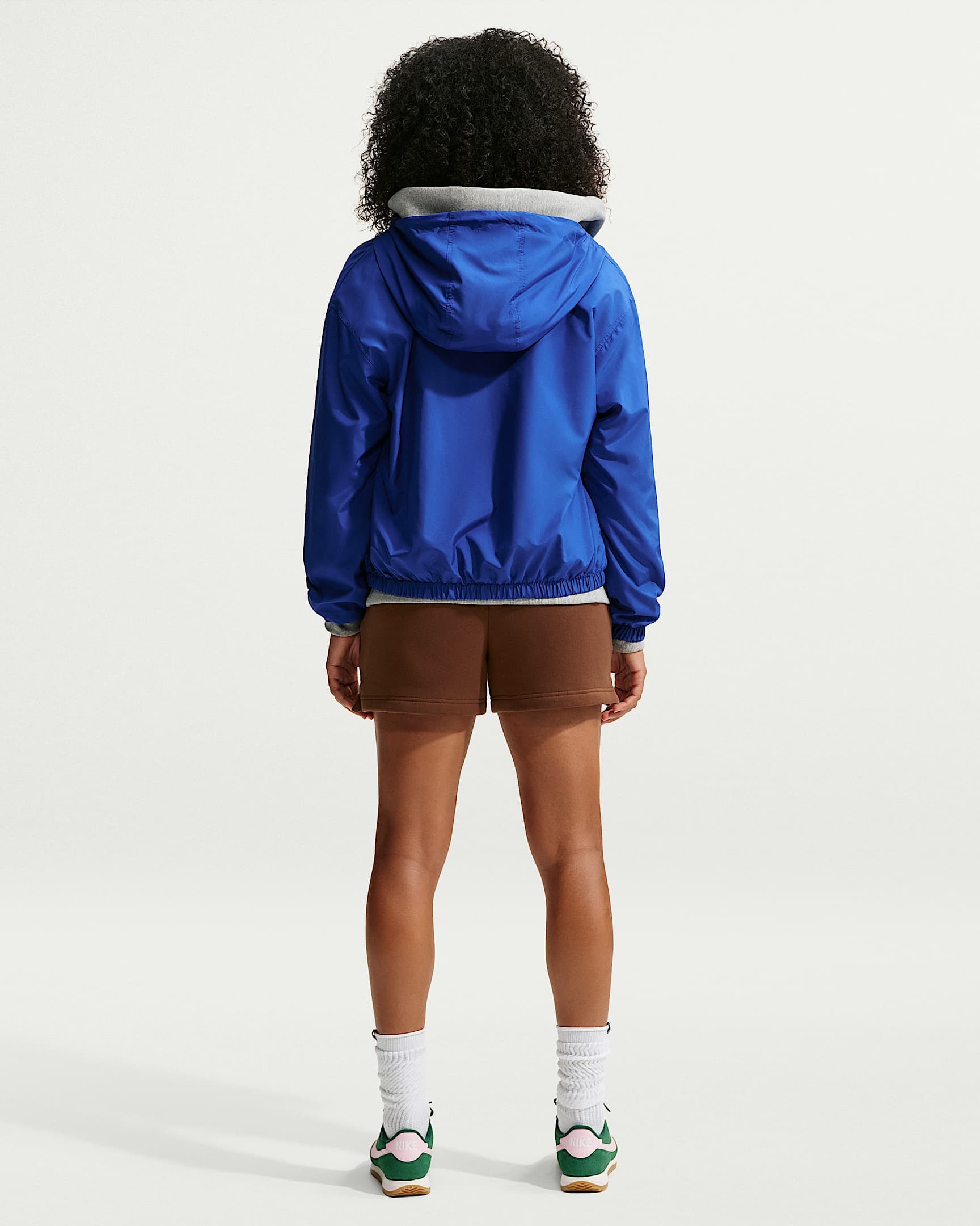 Nike Sportswear Shorts »W NK STDO FLC MW MR STD 4 SHRT«  mit Eingrifftaschen, ca. Mitte Oberschenkel lang, gerade Beinform
