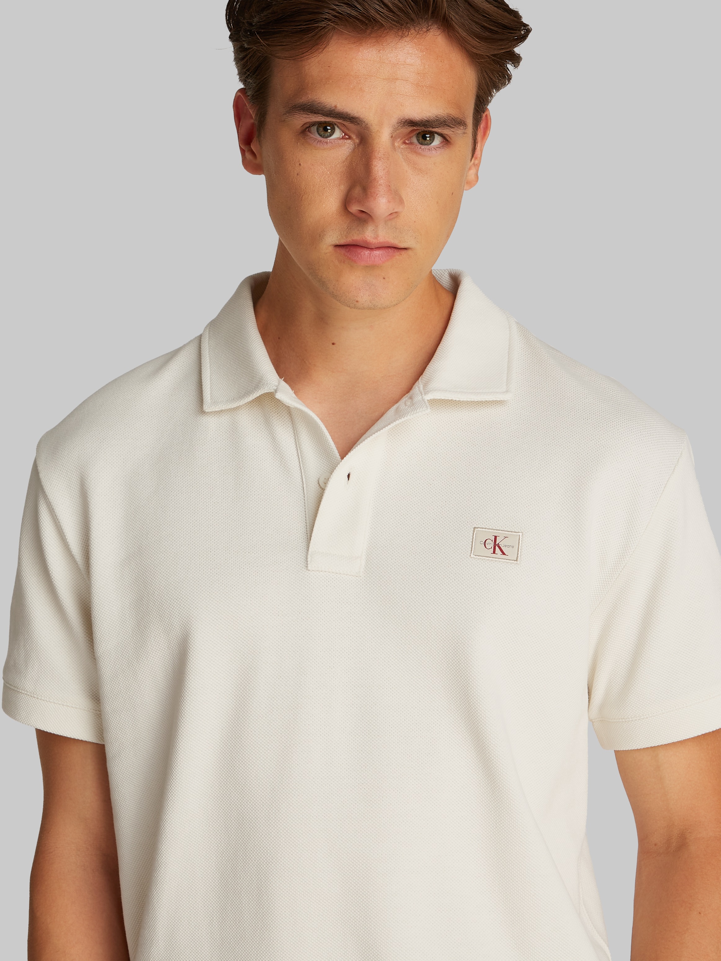 Calvin Klein Jeans Poloshirt »WOVEN LABEL POLO«, Logodruck