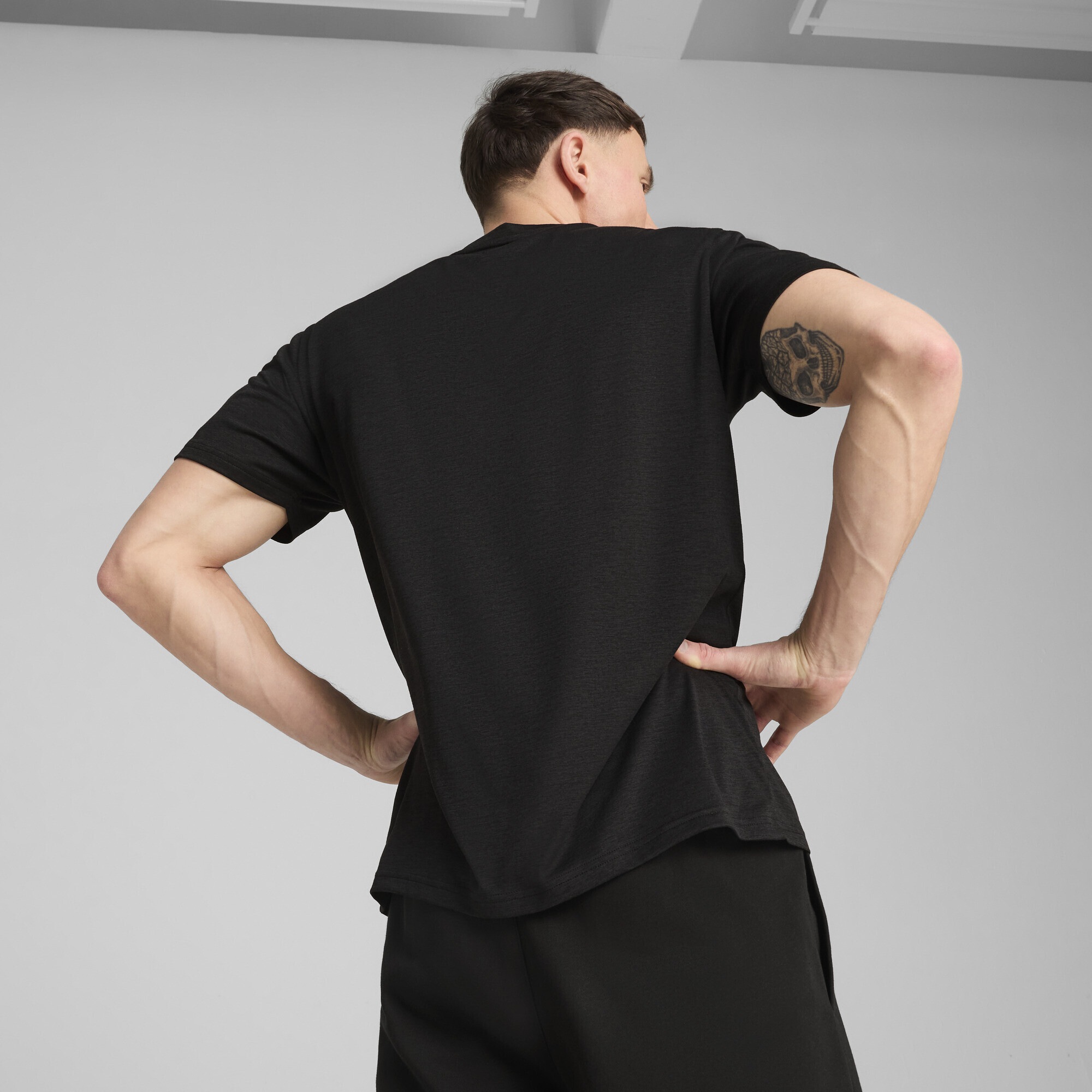 PUMA Trainingsshirt »TAD ESSENTIALS Meliertes T-Shirt mit Cat Logo Herren«
