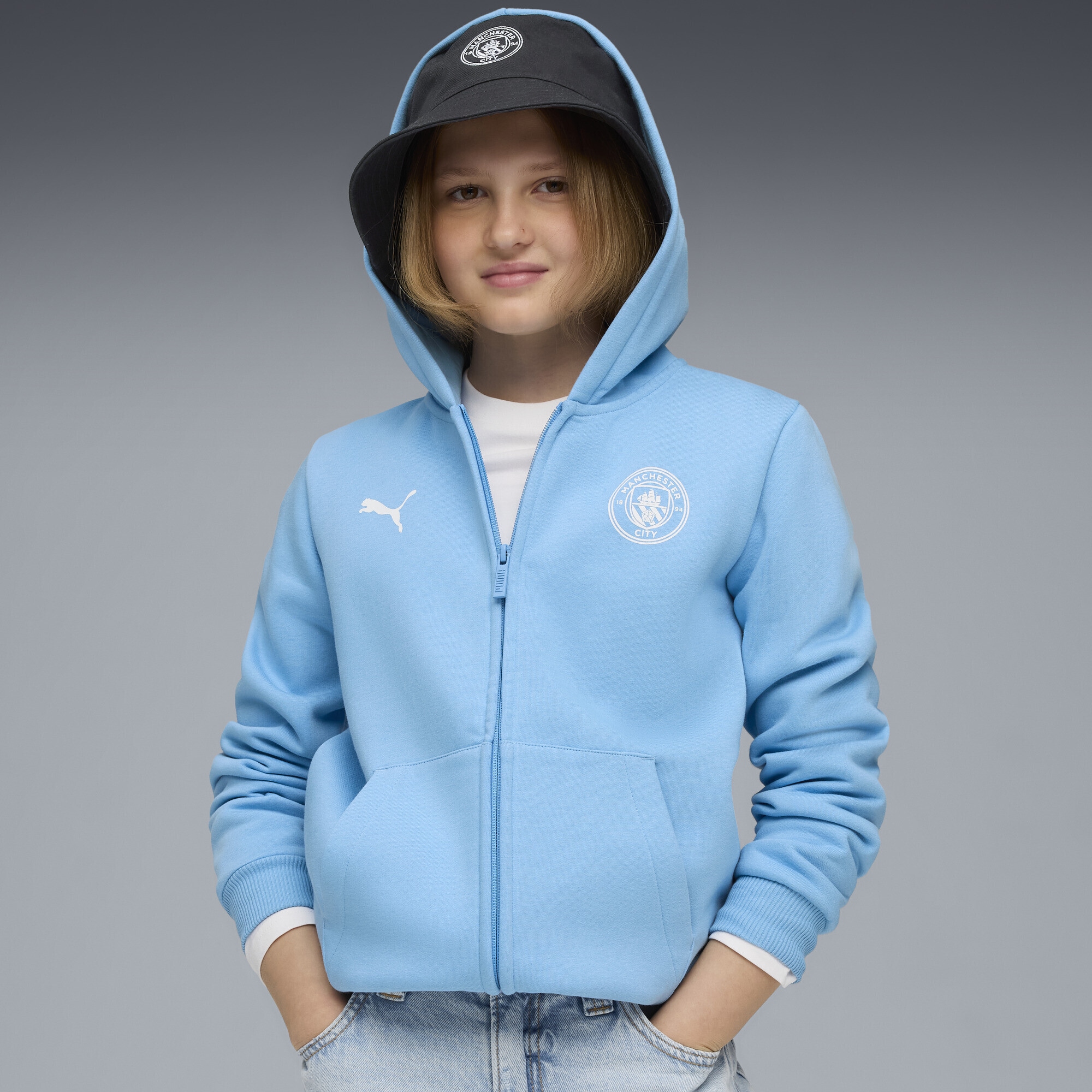 PUMA Sweatjacke »Manchester City FtblEssentials Kapuzenjacke Jugendliche«