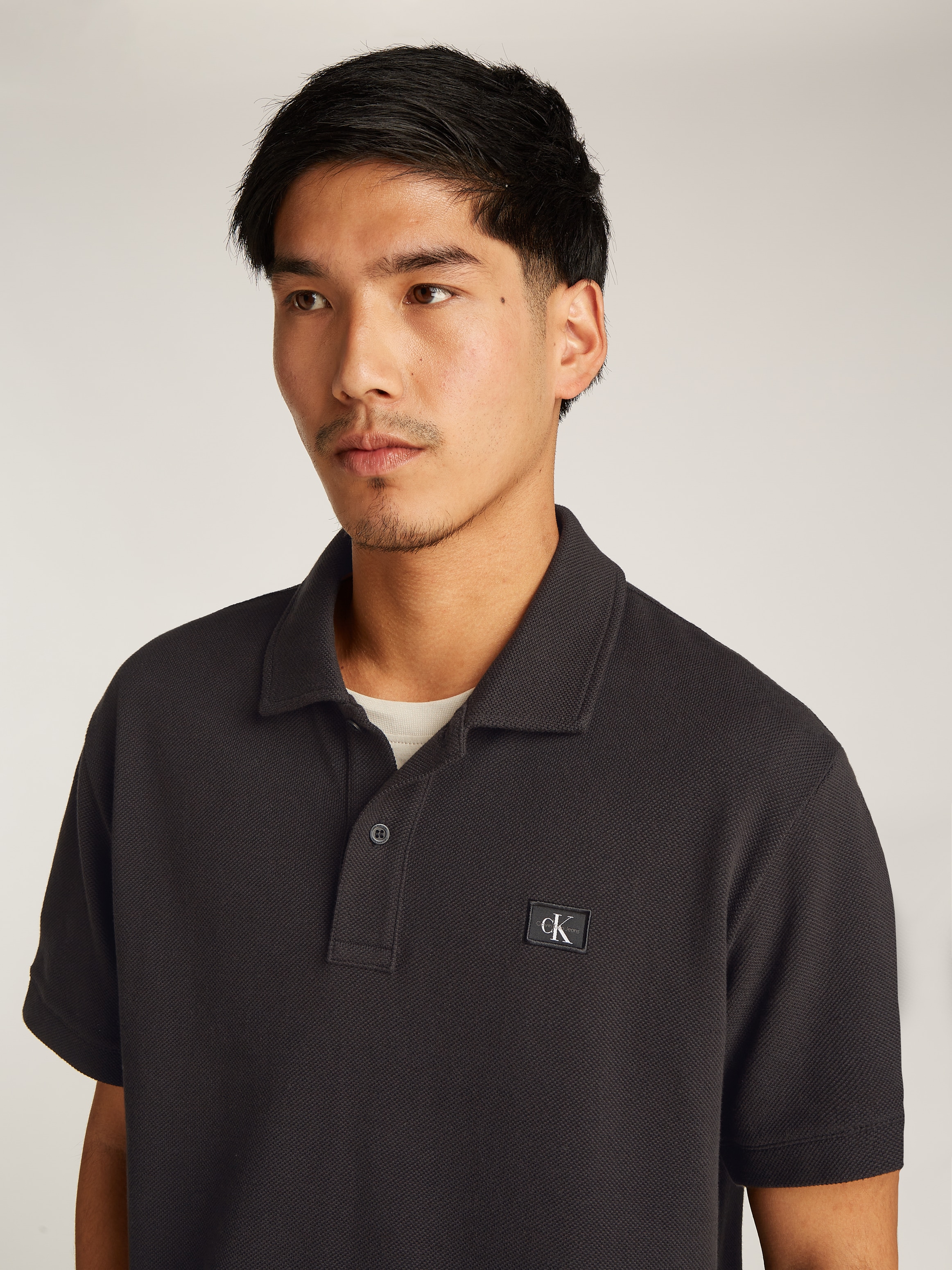 Calvin Klein Jeans Poloshirt »WOVEN LABEL POLO«, Logodruck