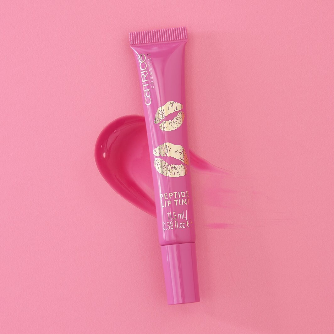 Thumbnail - Catrice Lipgloss "KISS & GLOW Peptide Lip Tint" dezente Farbe, ultra-glänzendes Finish, pflegend und vegan.