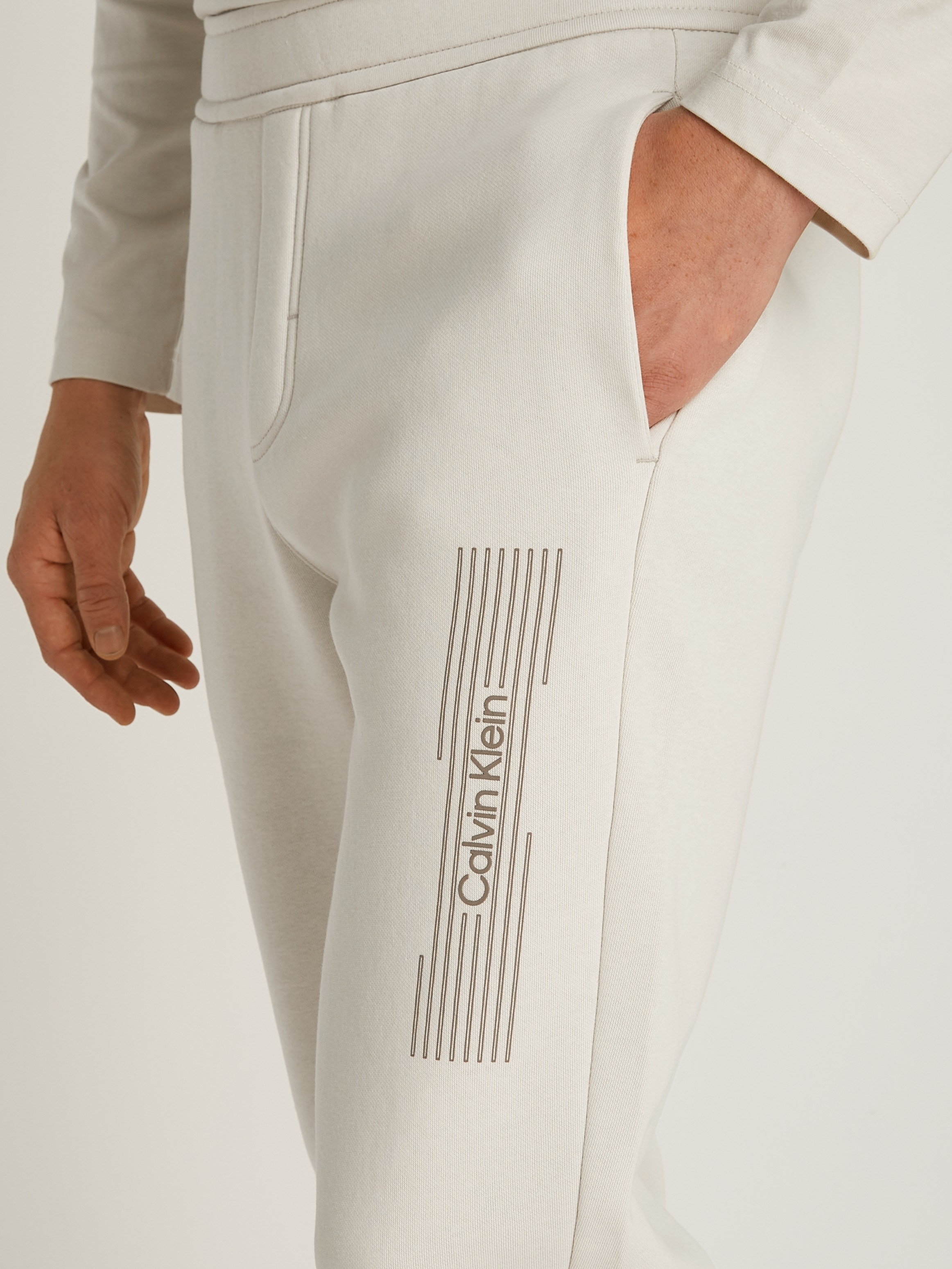 Calvin Klein Jogger Pants »HORIZONTAL LOGO SWEATPANTS«, mit Logoschriftzug