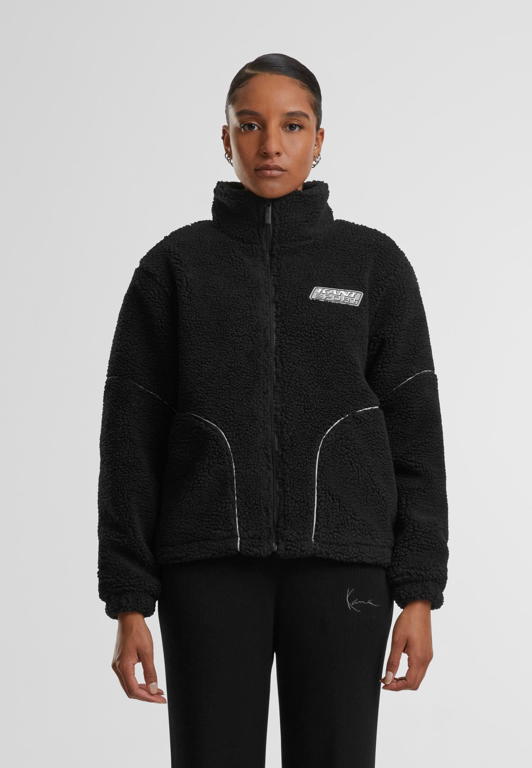 Karl Kani Trainingsjacke »Karl Kani Karl Kani Sport Patch Teddy Block Trackjacket«, (1 St.), ohne Kapuze