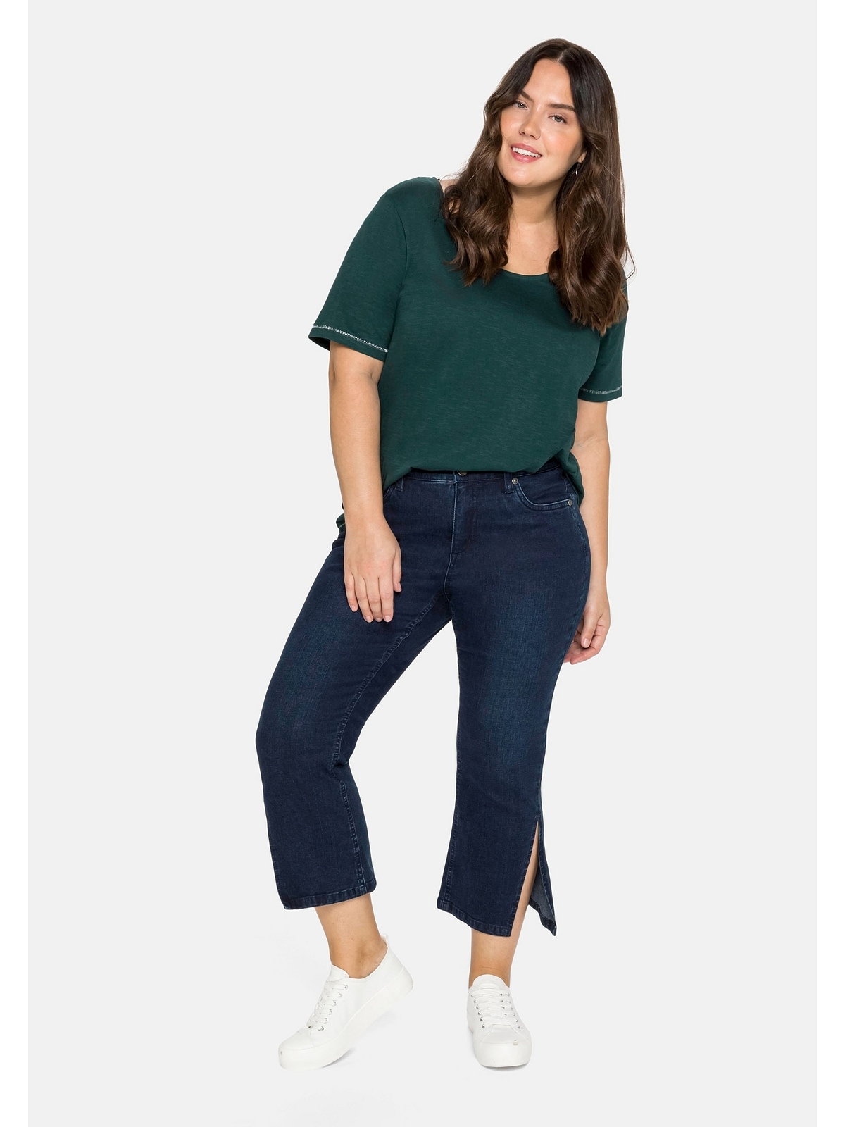 2024 ist da! Sheego Bootcut-Jeans Saum hoch BAUR kaufen in »Große | geschlitztem 7/8-Länge mit Größen«, für