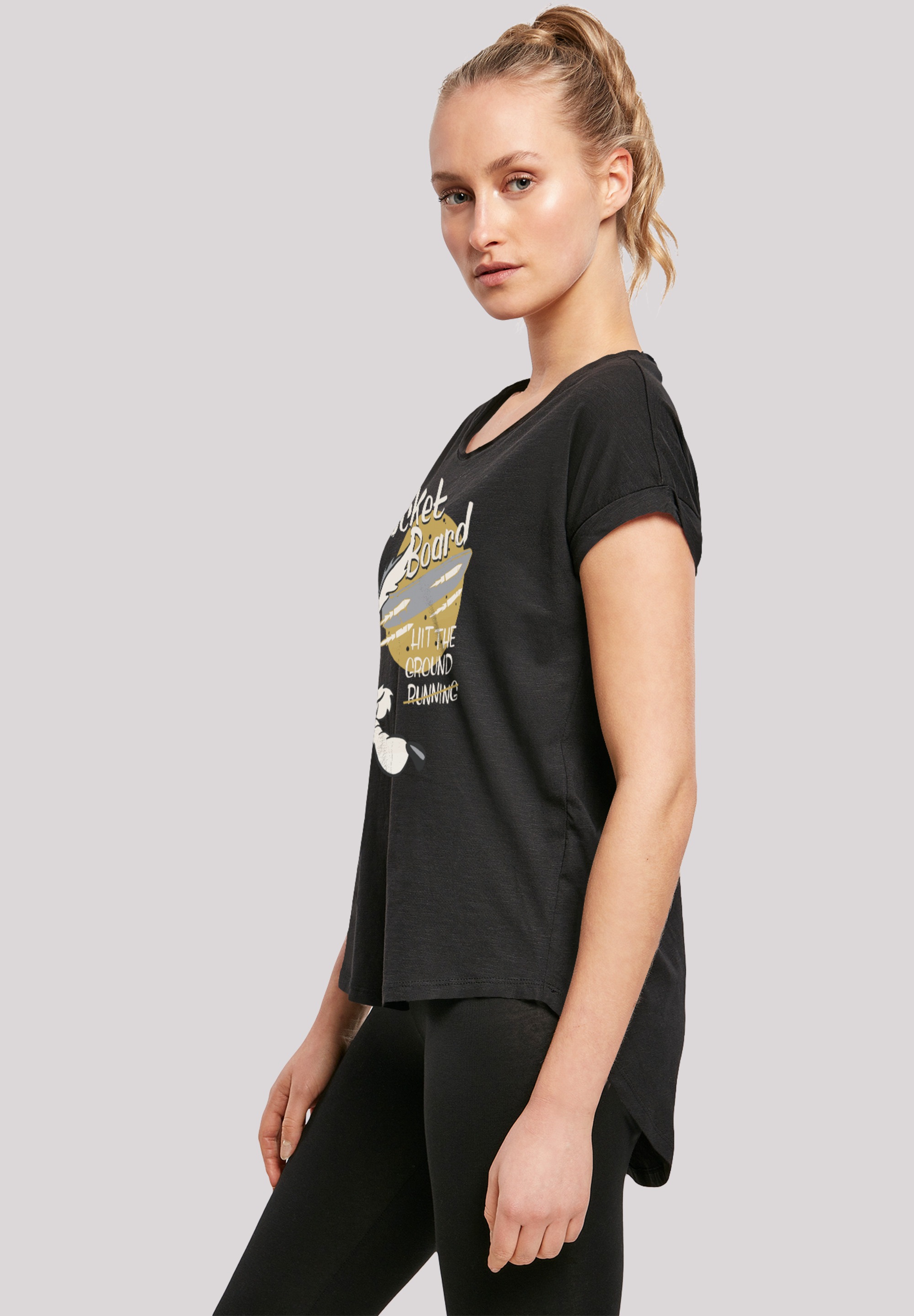 F4NT4STIC T-Shirt »Looney Tunes Wile E Rocket Board Cartoon«, Damen,Premium Merch,Lang,Longshirt,Bedruckt