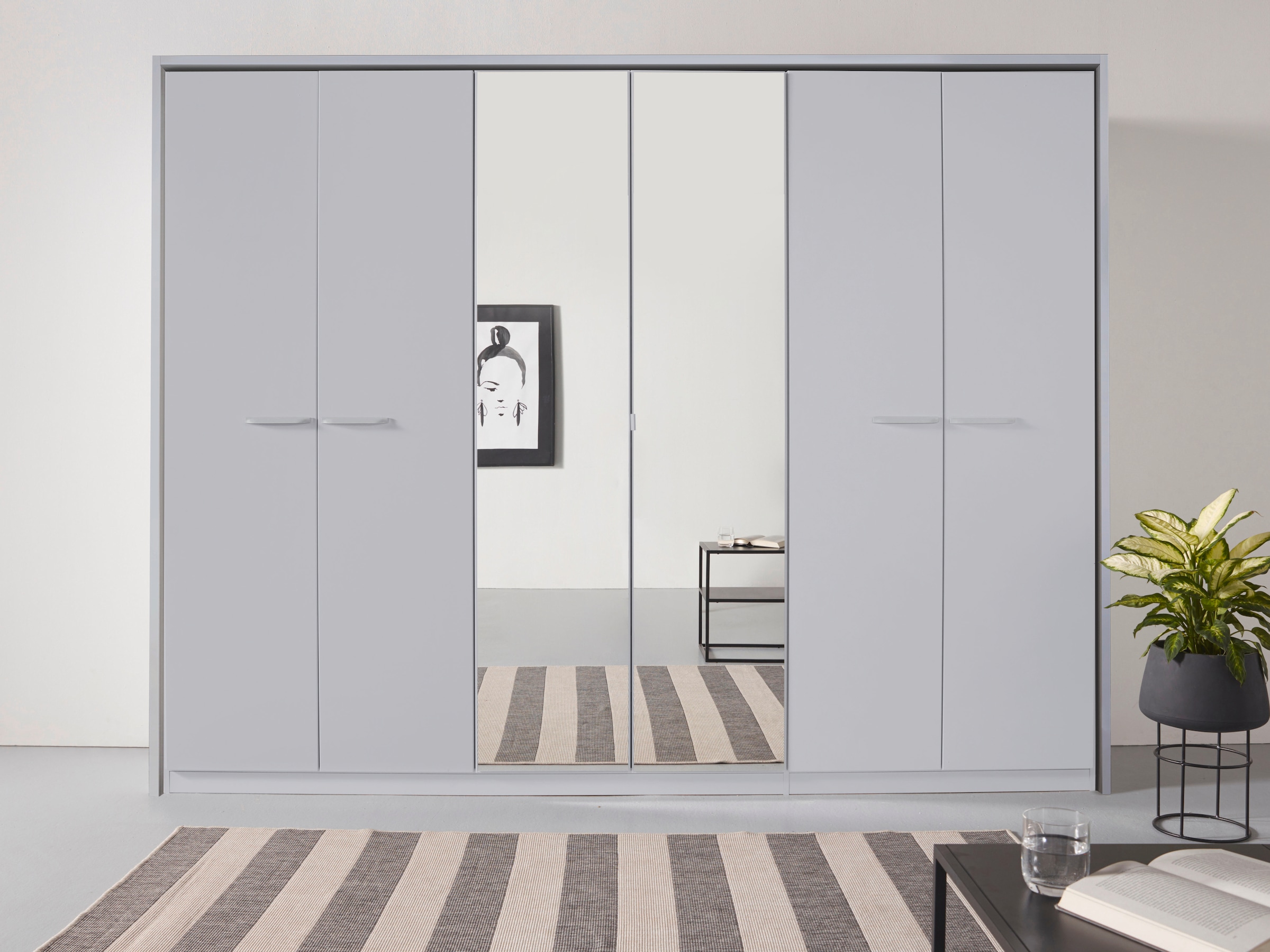rauch Drehtürenschrank »Oteli«, mit Mittelspiegel und Passepartout optional mit Beleuchtung