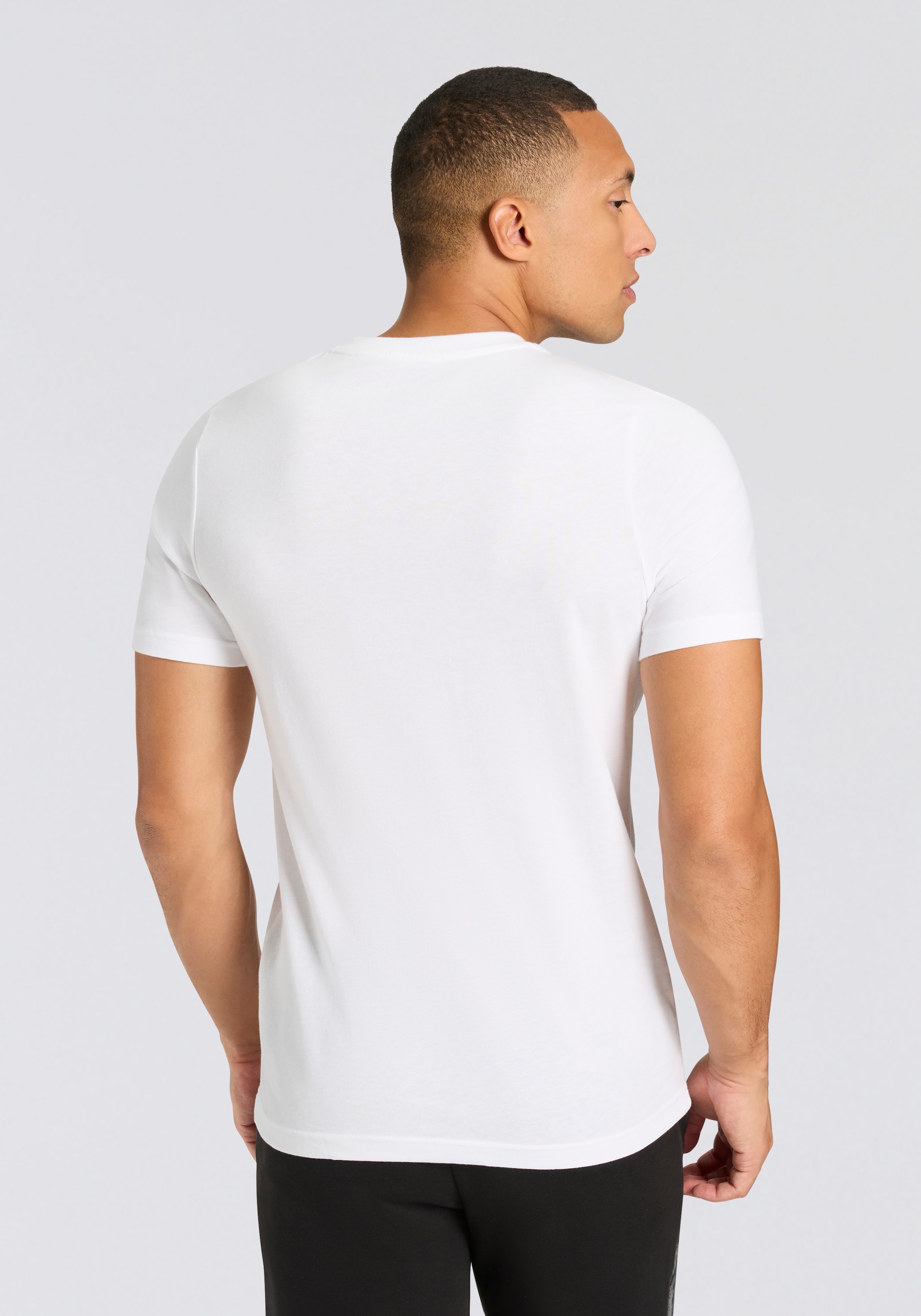 PUMA T-Shirt »ESS CAMO TEE«