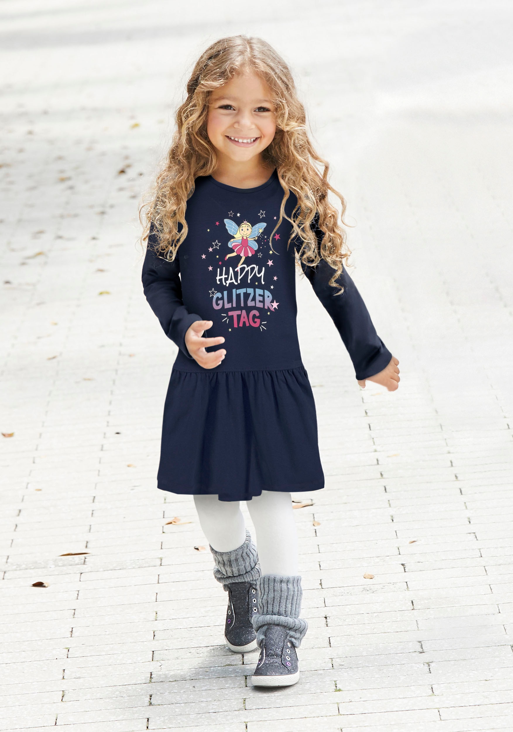 KIDSWORLD Jerseykleid "mit Spruch: HAPPY GLITZER TAG" Shirtkleid mit Feenprint, kniefreie Länge, verspielter Look