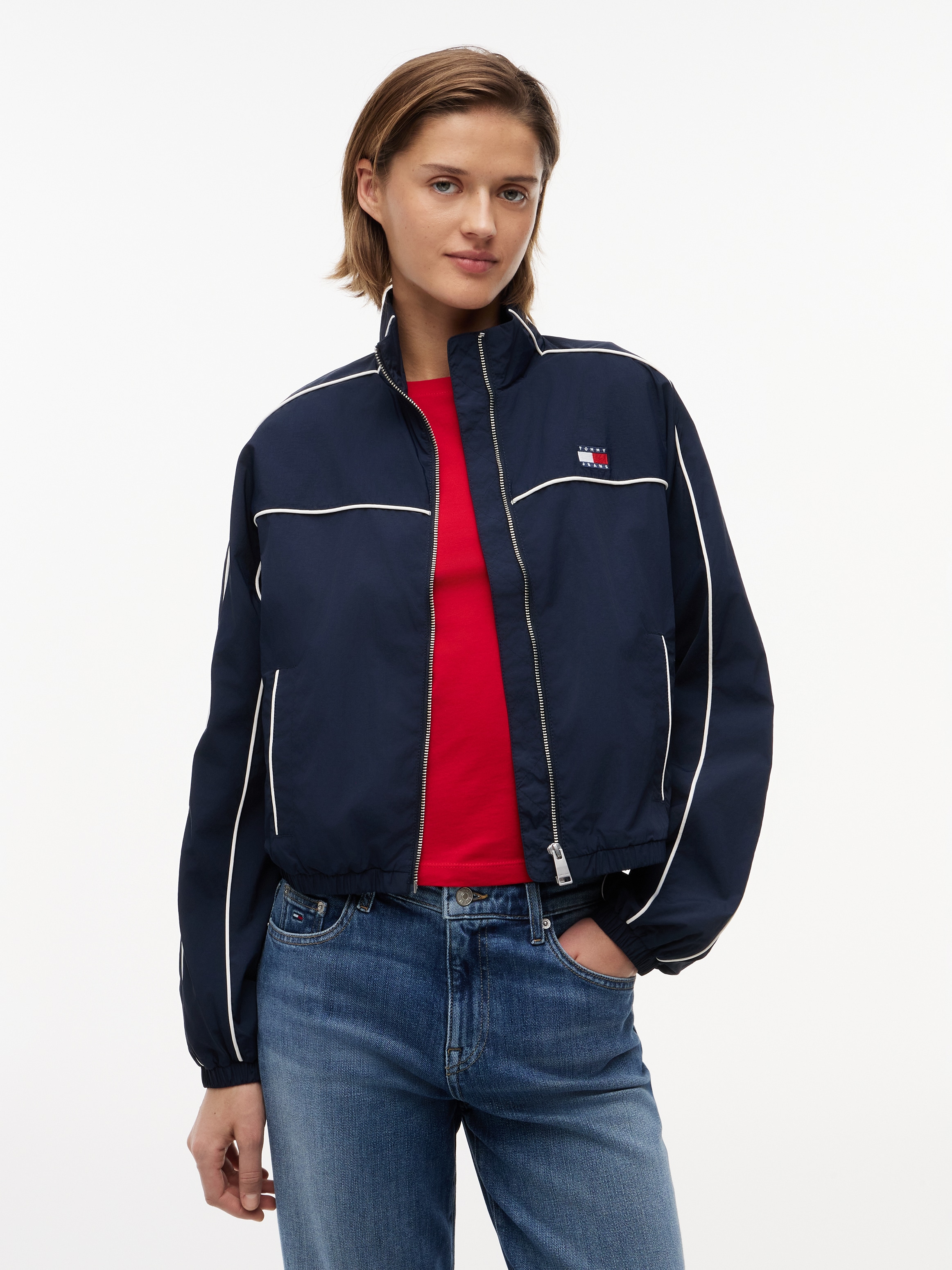 Tommy Jeans Blouson "TJW NYLON PIPING JACKET" mit kontrastfarbener Paspelierung