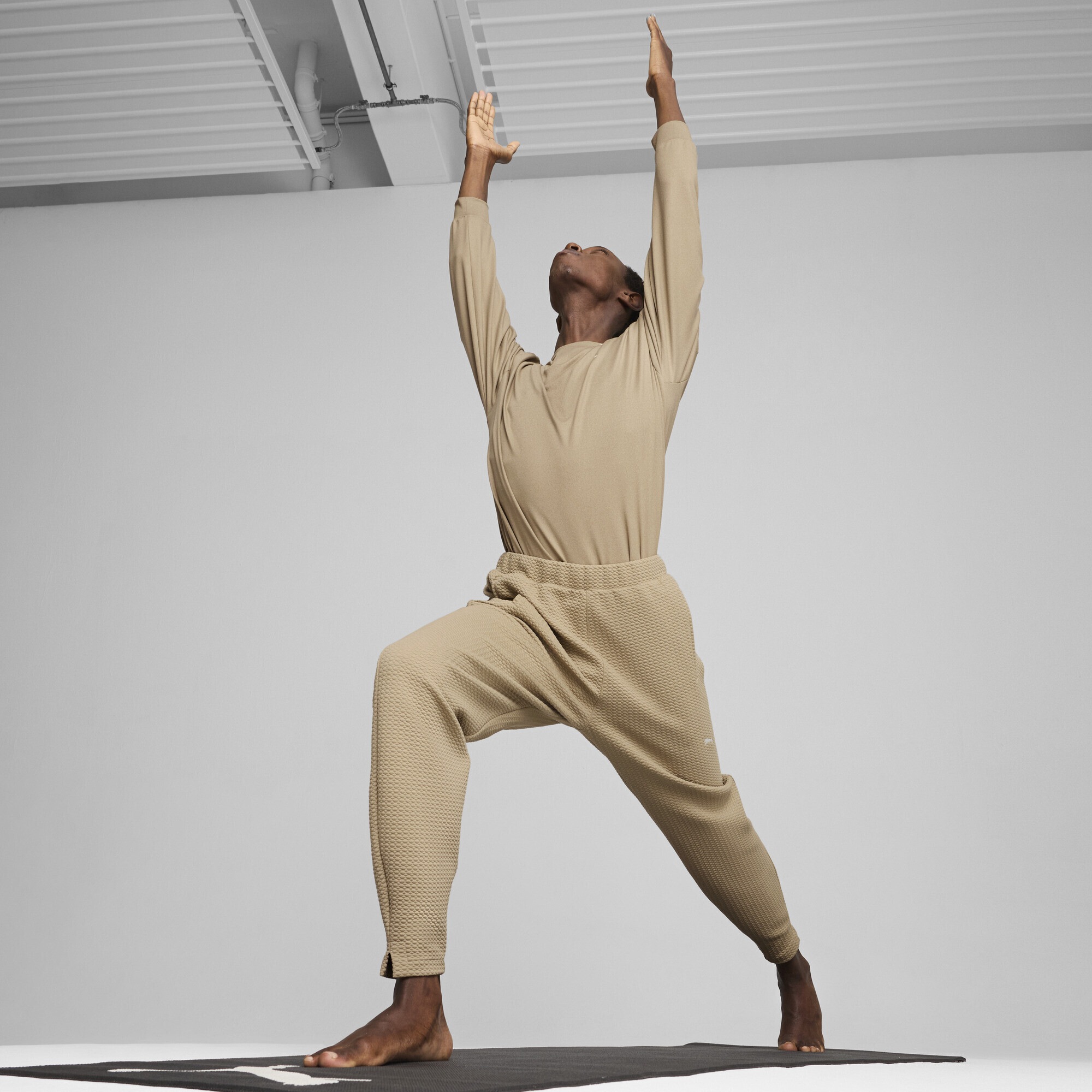 PUMA Yogahose »STUDIO Texture Hose Herren«