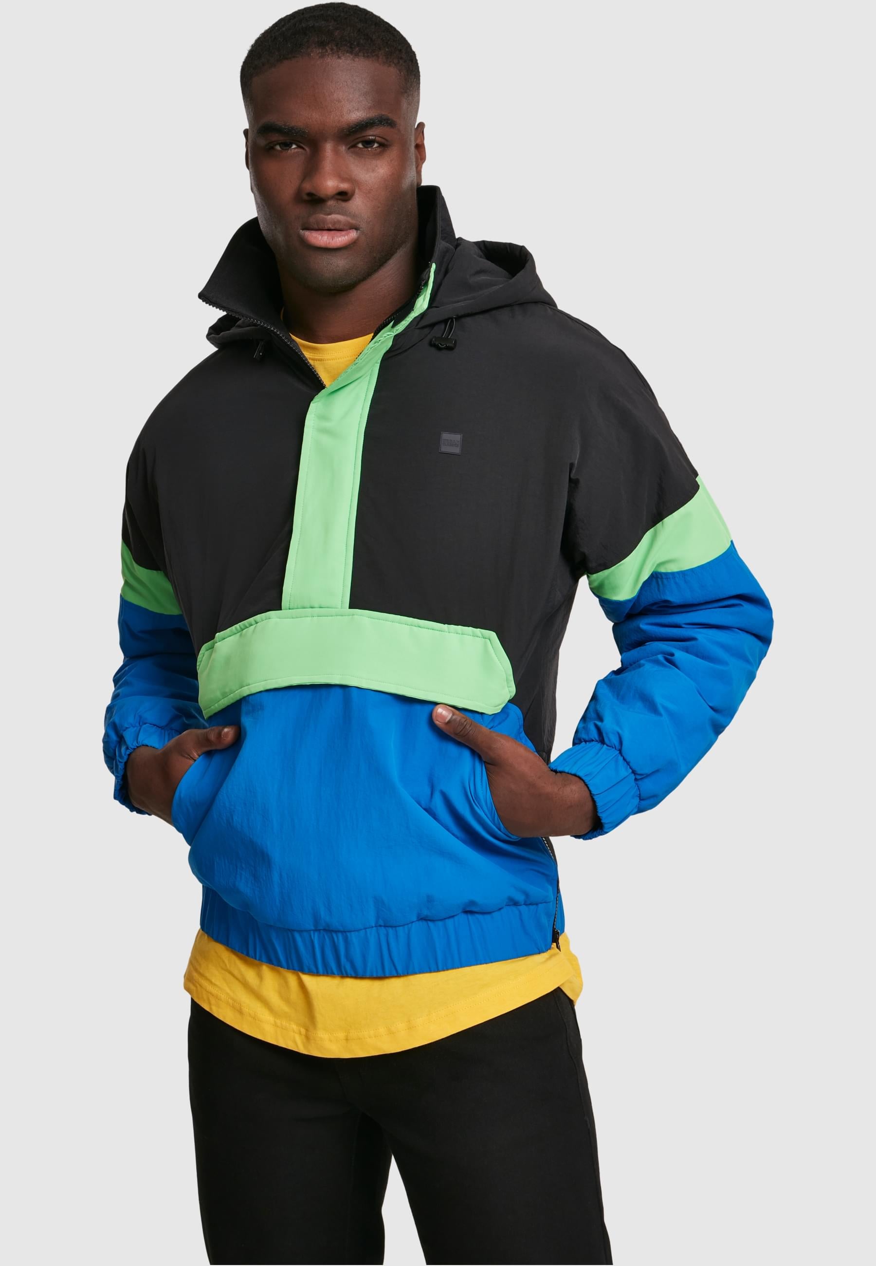 URBAN CLASSICS Allwetterjacke »Urban Classics Herren 3-Tone Neon Mix Pull Over Jacket«, (1 St.), mit Kapuze