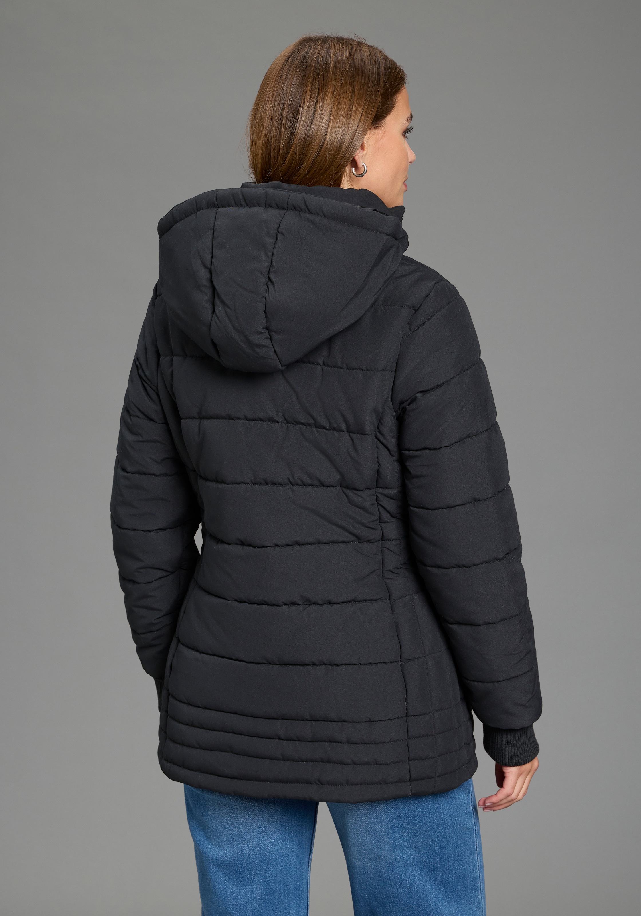ALPENBLITZ Steppjacke "Flockenwirbel" mit Kapuze für den Übergang, aus leichtem Material, unifarbenes Design