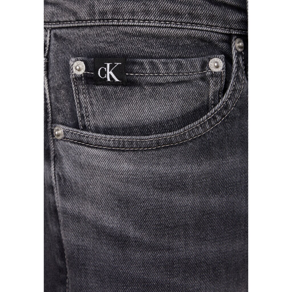 Calvin Klein Jeans Slim-fit-Jeans »SLIM«, mit Calvin Klein Leder-Badge