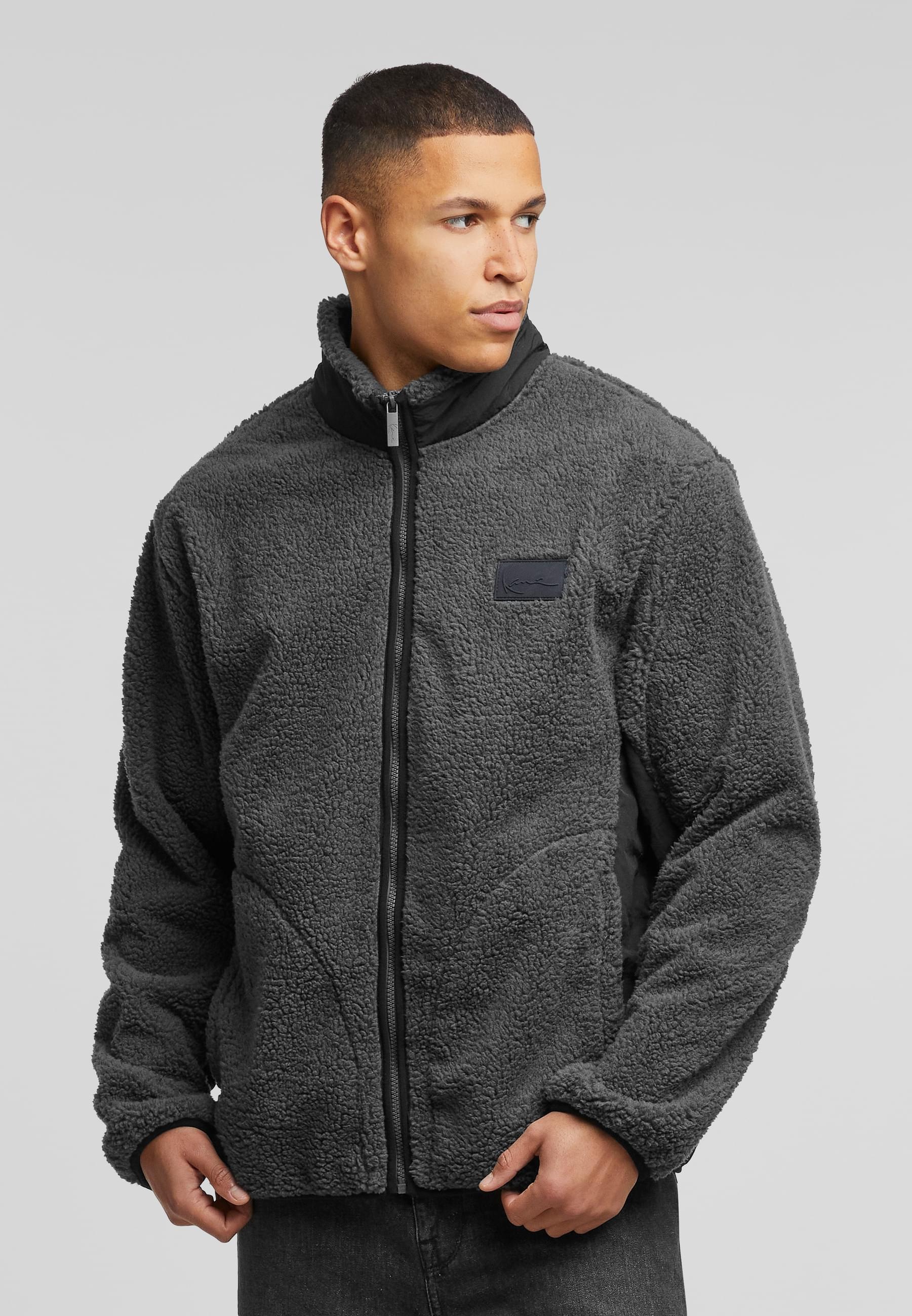 Thumbnail - Karl Kani Allwetterjacke "Karl Kani Karl Kani Sport Patch Teddy Jacket" 1 Stk. tlg. mit Kapuze