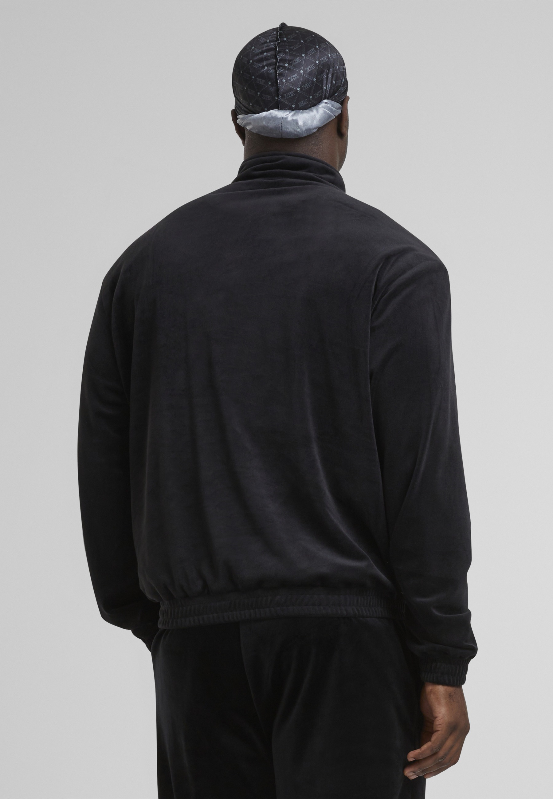 Karl Kani Trainingsjacke »Karl Kani Kani Varsity Velours Trackjacket« 1 Stk. tlg. ohne Kapuze