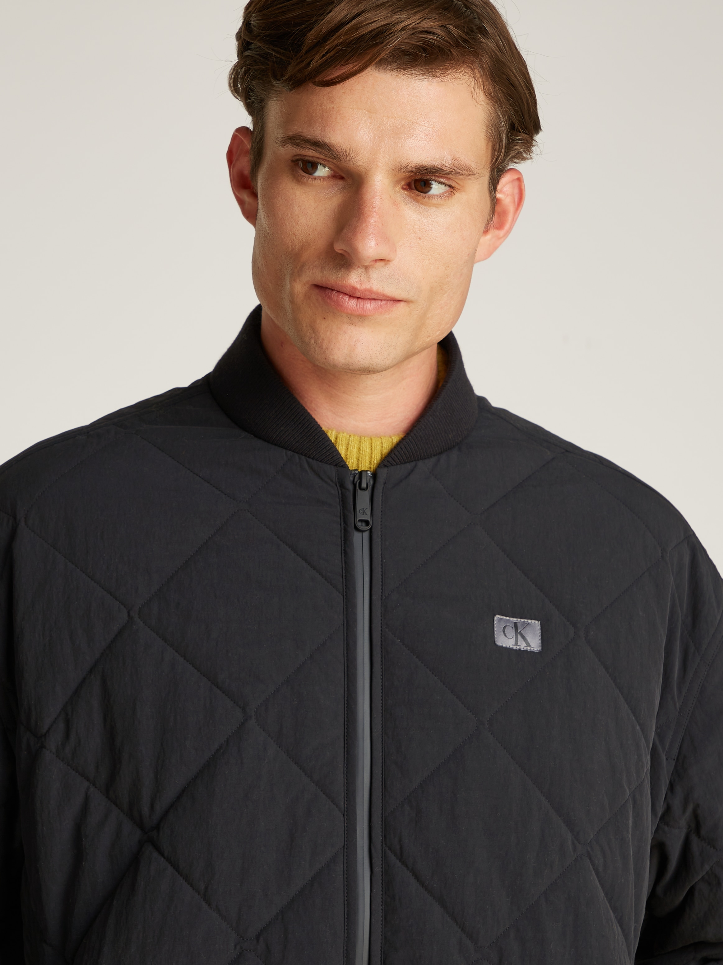 Calvin Klein Jeans Steppjacke »QUILTED JACKET« Logopatch, Stehkragen