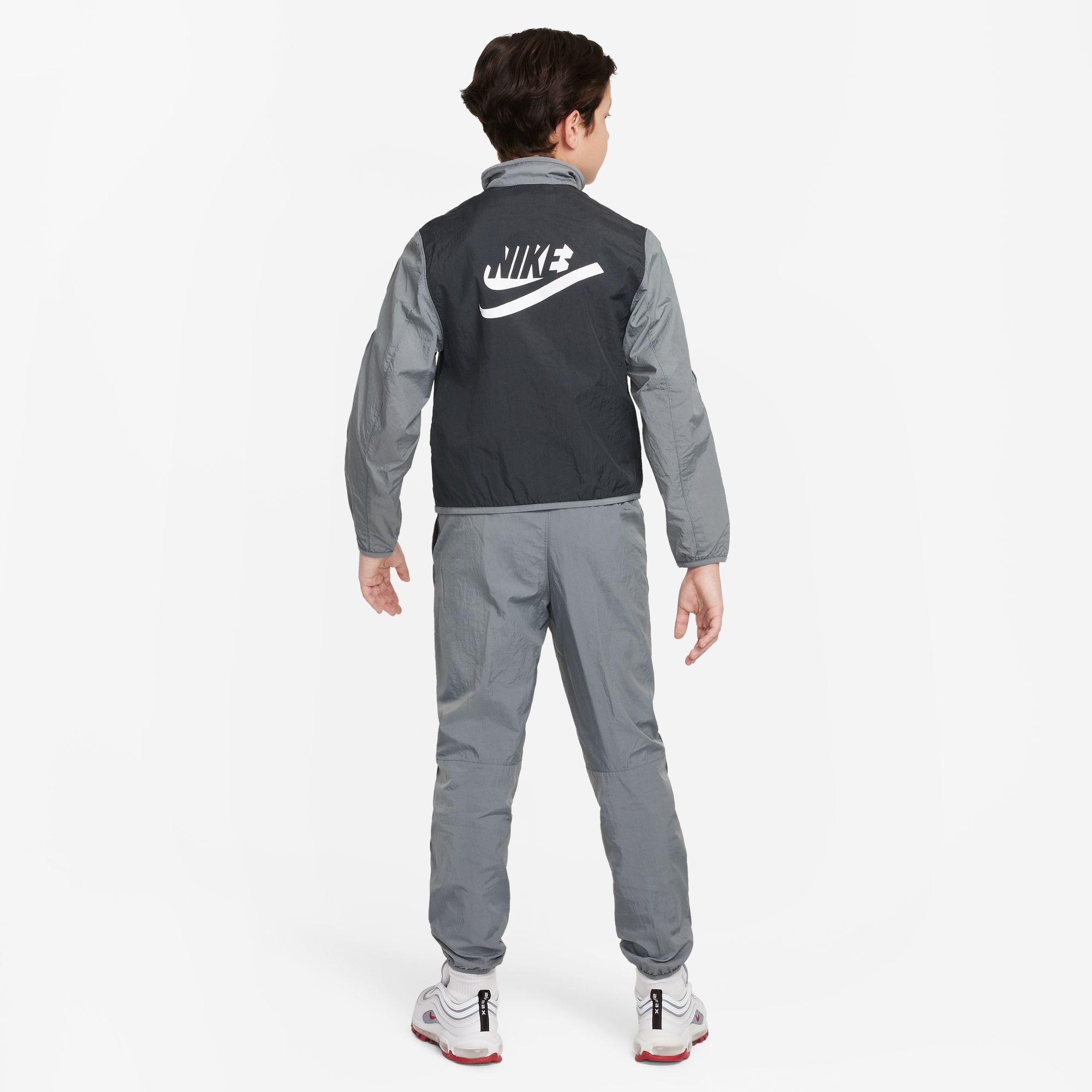 Big boys nike track suit deals