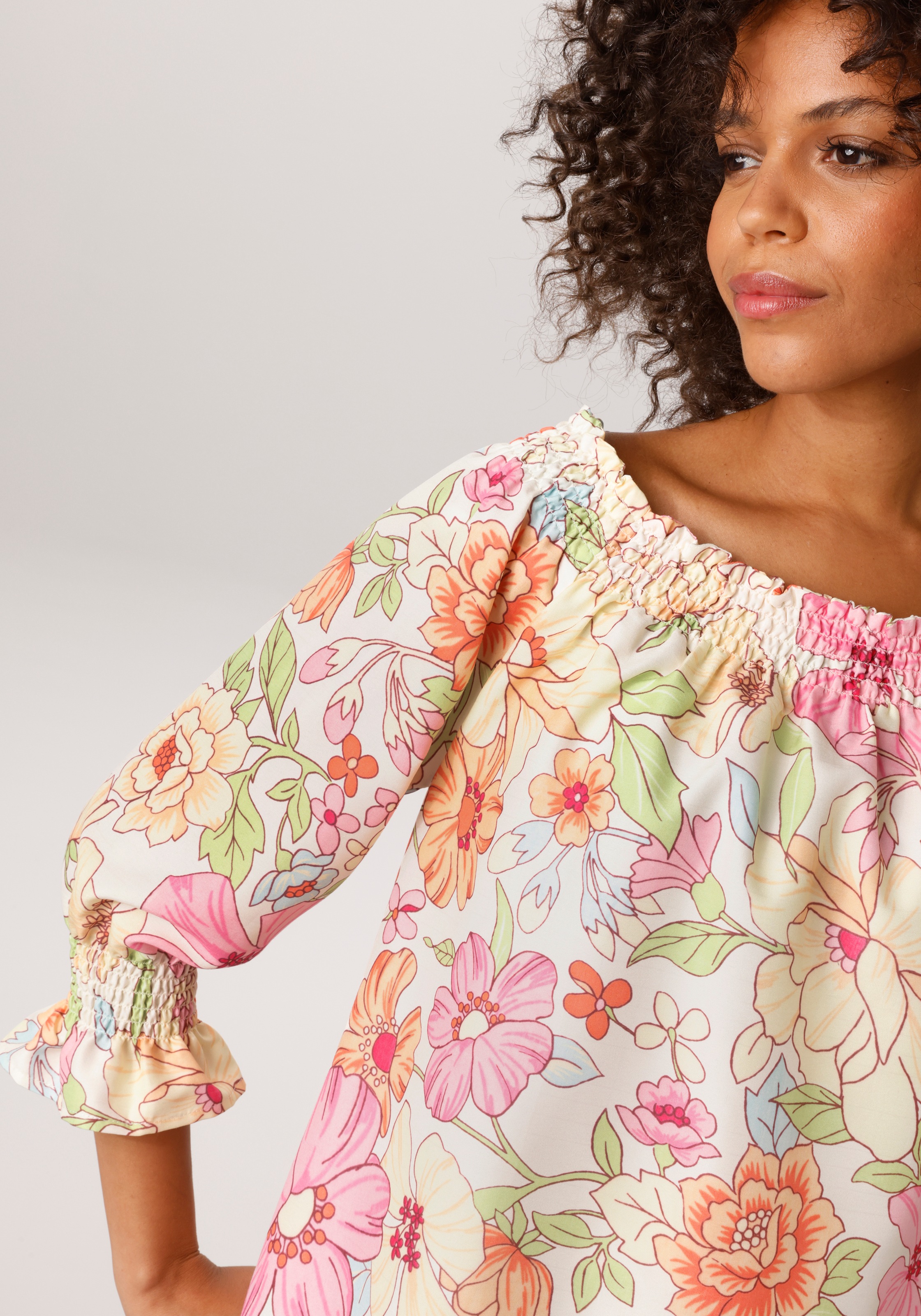 Aniston CASUAL Schlupfbluse mit großflächigem, pastellfarbenen Blumendruck günstig online kaufen