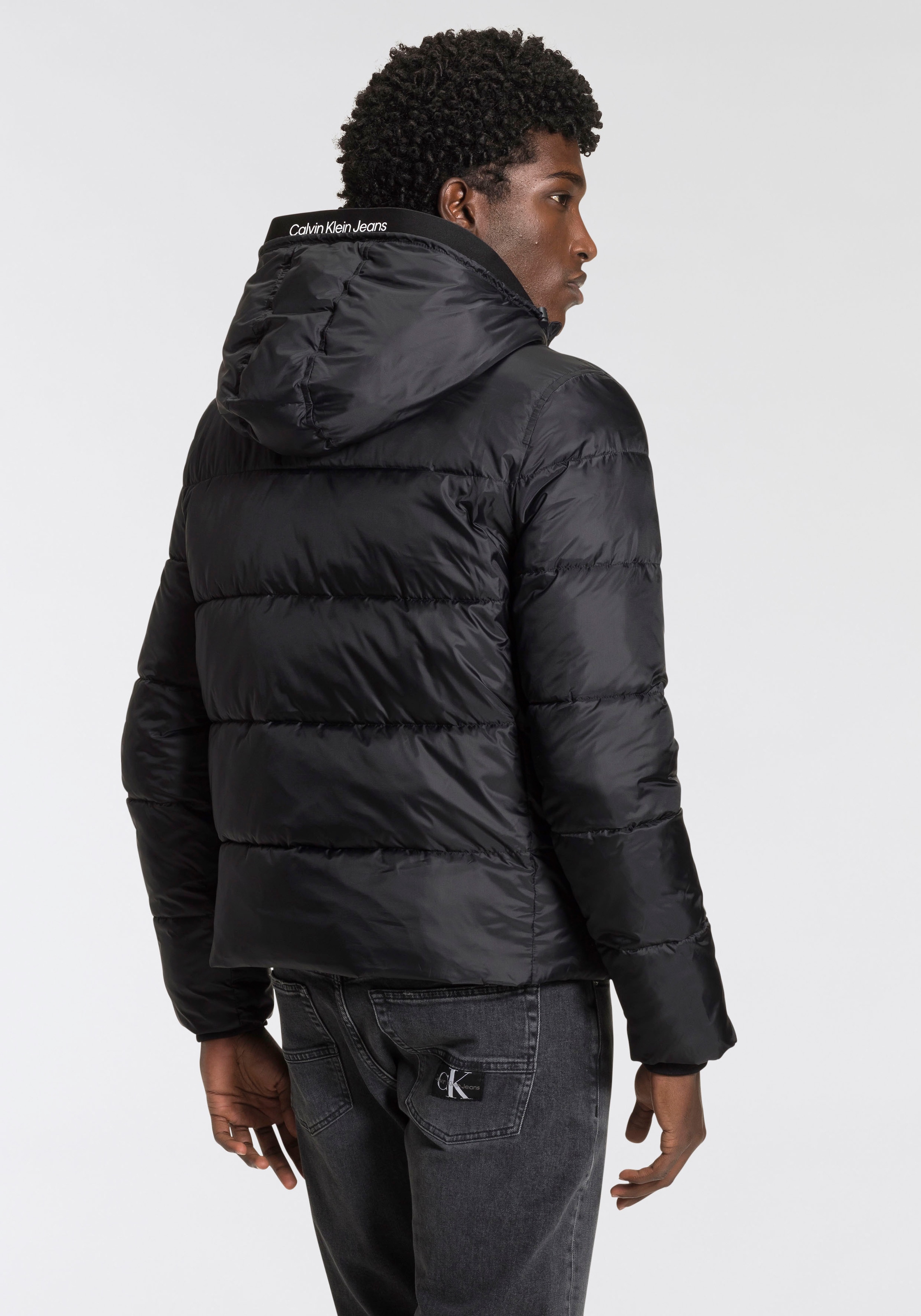 Calvin Klein Jeans Steppjacke »LOGO TAPE LW PADDED JACKET«, mit Kapuze