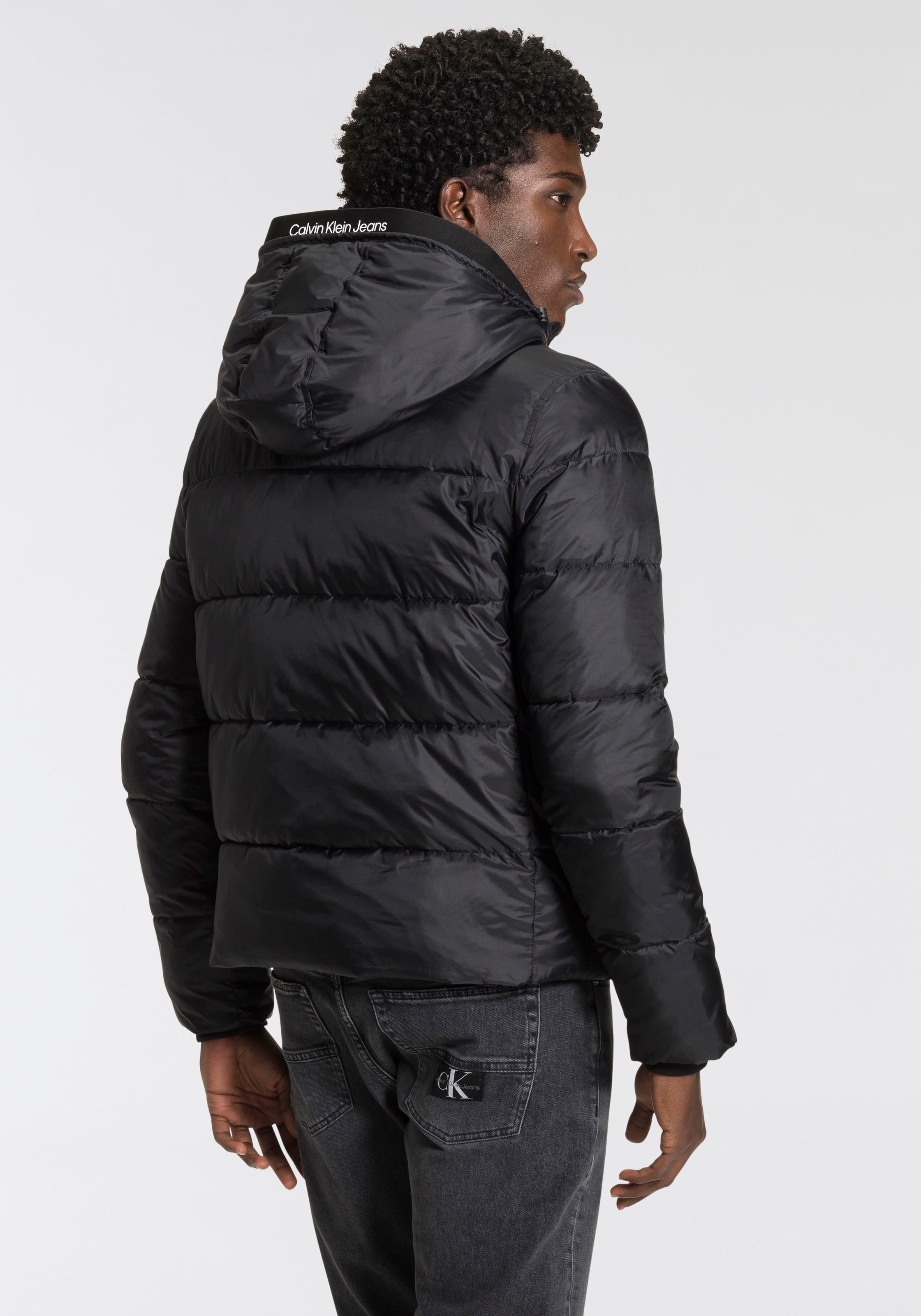 Calvin Klein Jeans Steppjacke "LOGO TAPE LW PADDED JACKET" mit Kapuze günstig online kaufen