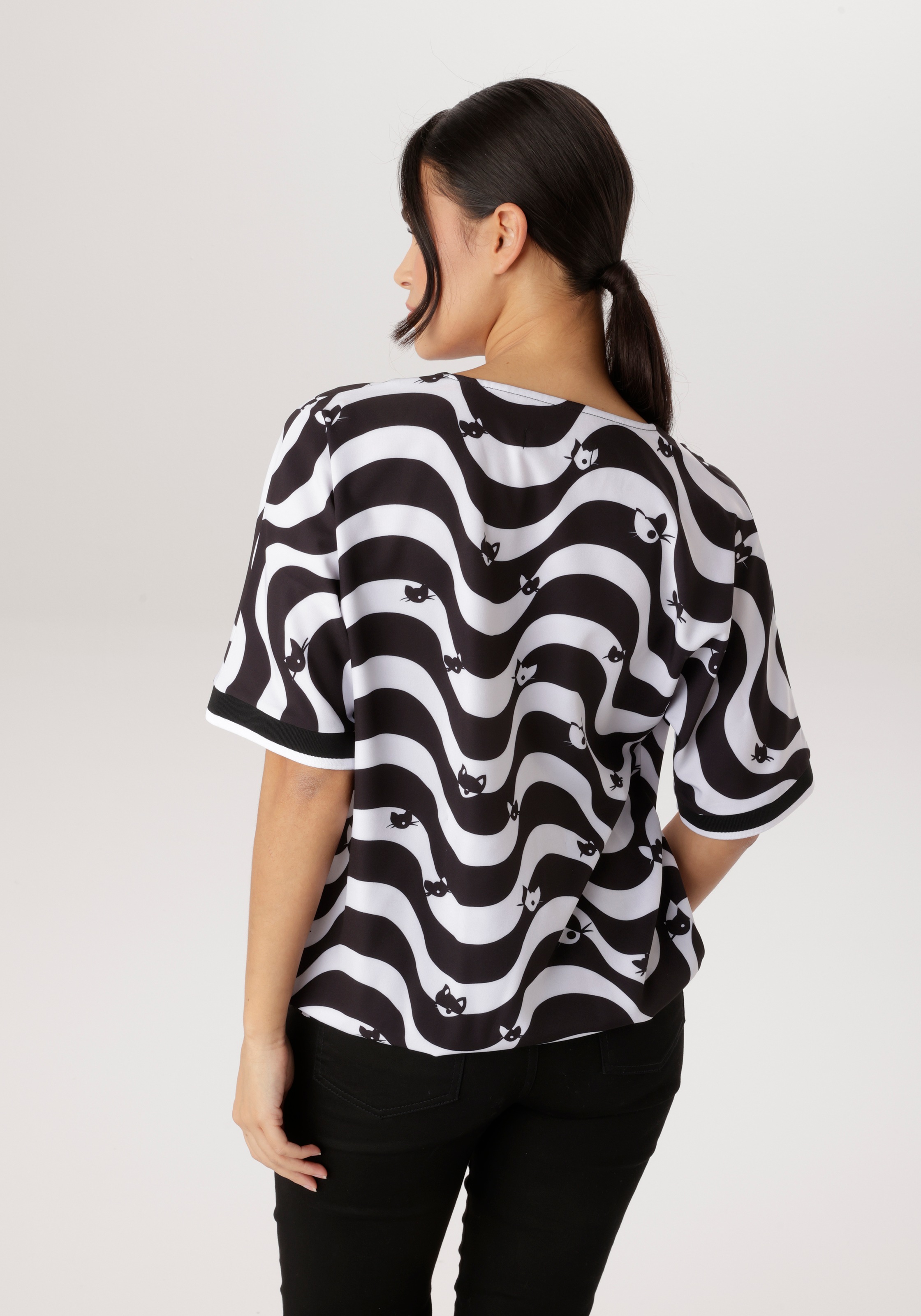 Aniston SELECTED Schlupfbluse mit Gummizug am Saum und grafischen Muster - günstig online kaufen