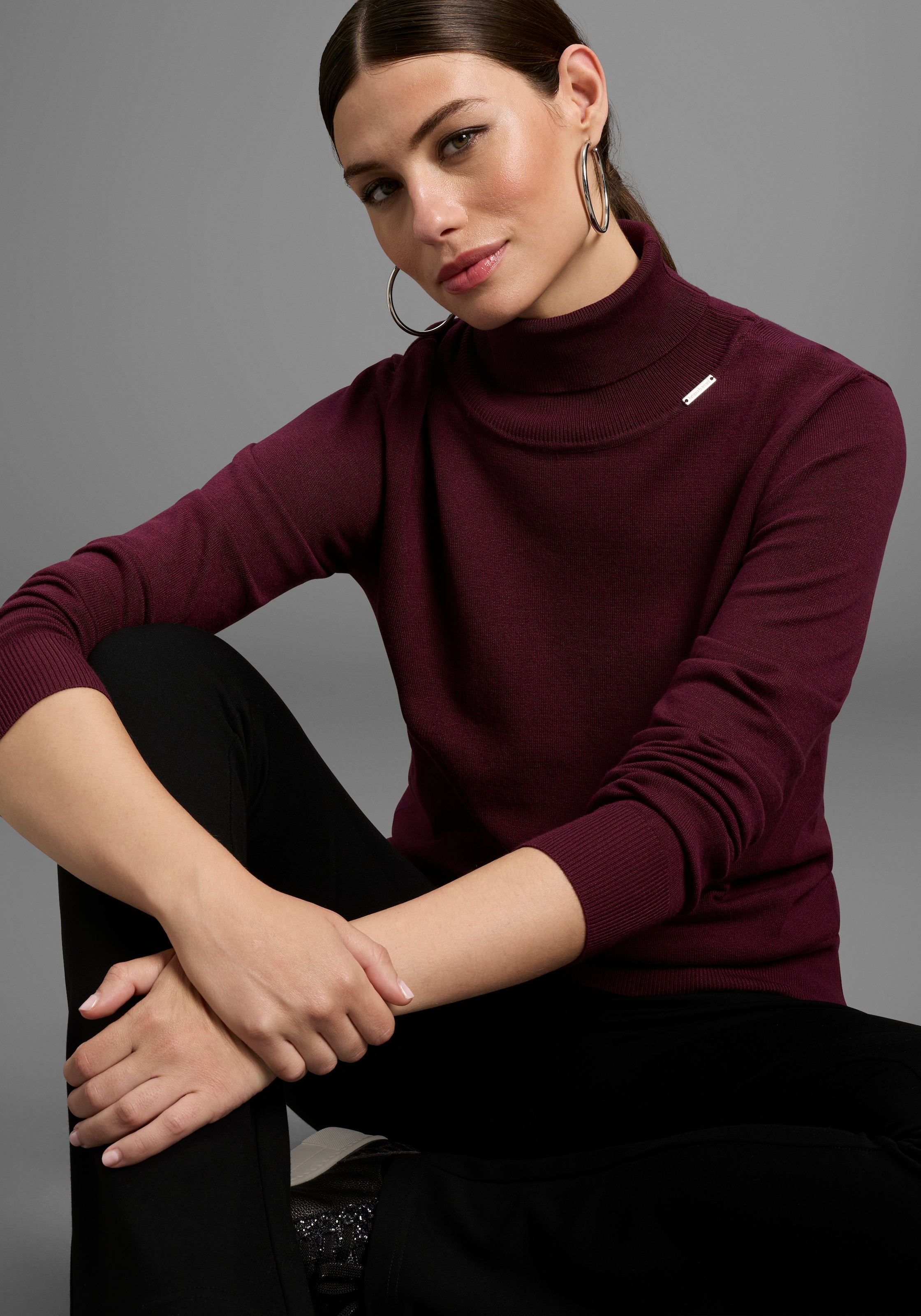 Bruno Banani Rollkragenpullover mit Metalllogo günstig online kaufen