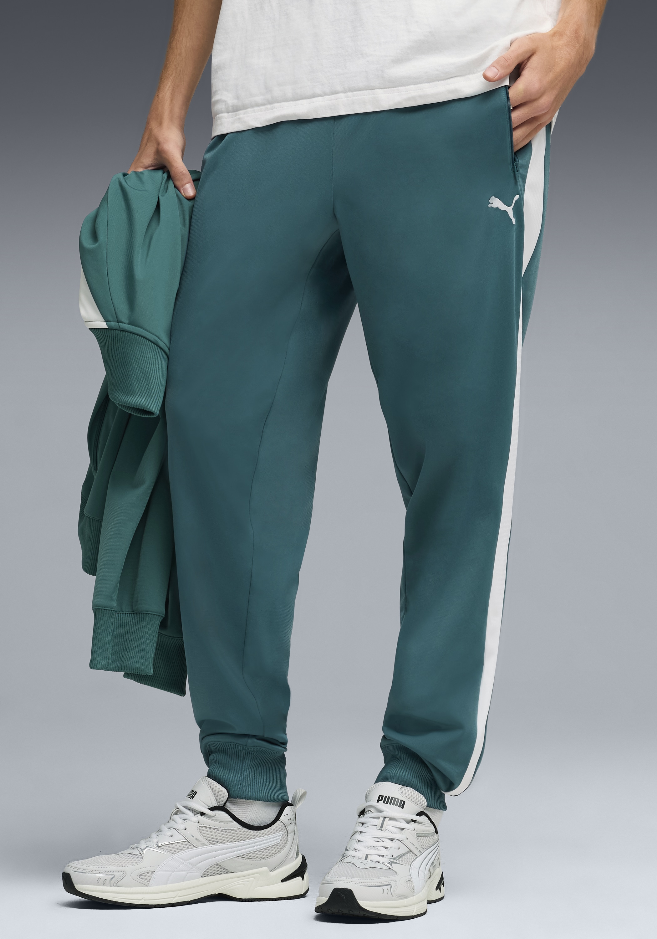 PUMA Trainingshose "T7 FOUNDATION CL POLY KNITTED PANTS" mit Eingrifftaschen, Regular Fit, sportlicher Stil