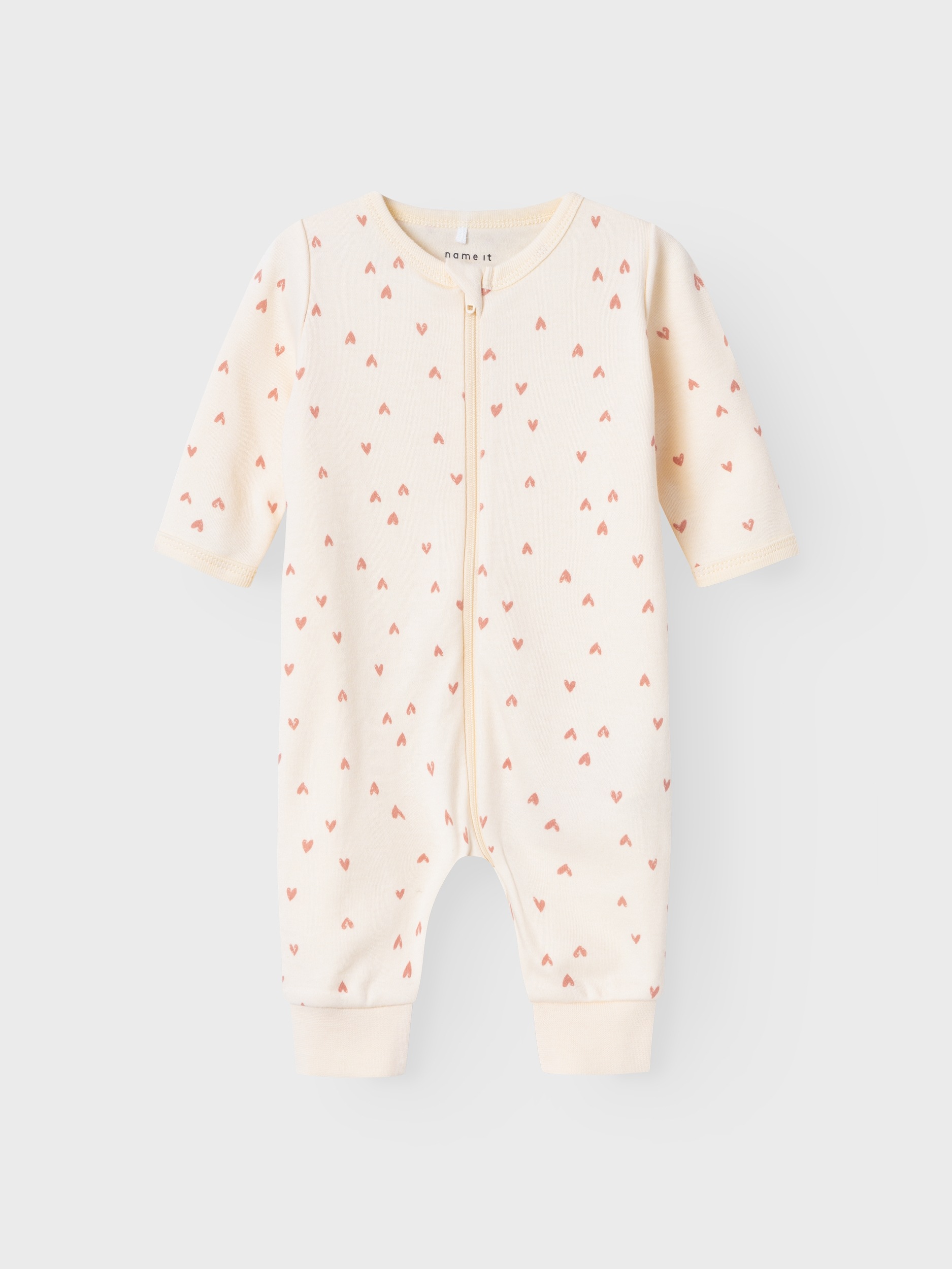 Name It Schlafanzug »NBFNIGHTSUIT ZIP BUTTERCREAM HEARTS NOOS« aus Baumwolle in Jersey-Qualität, Relaxed Fit, mit Reißverschluss