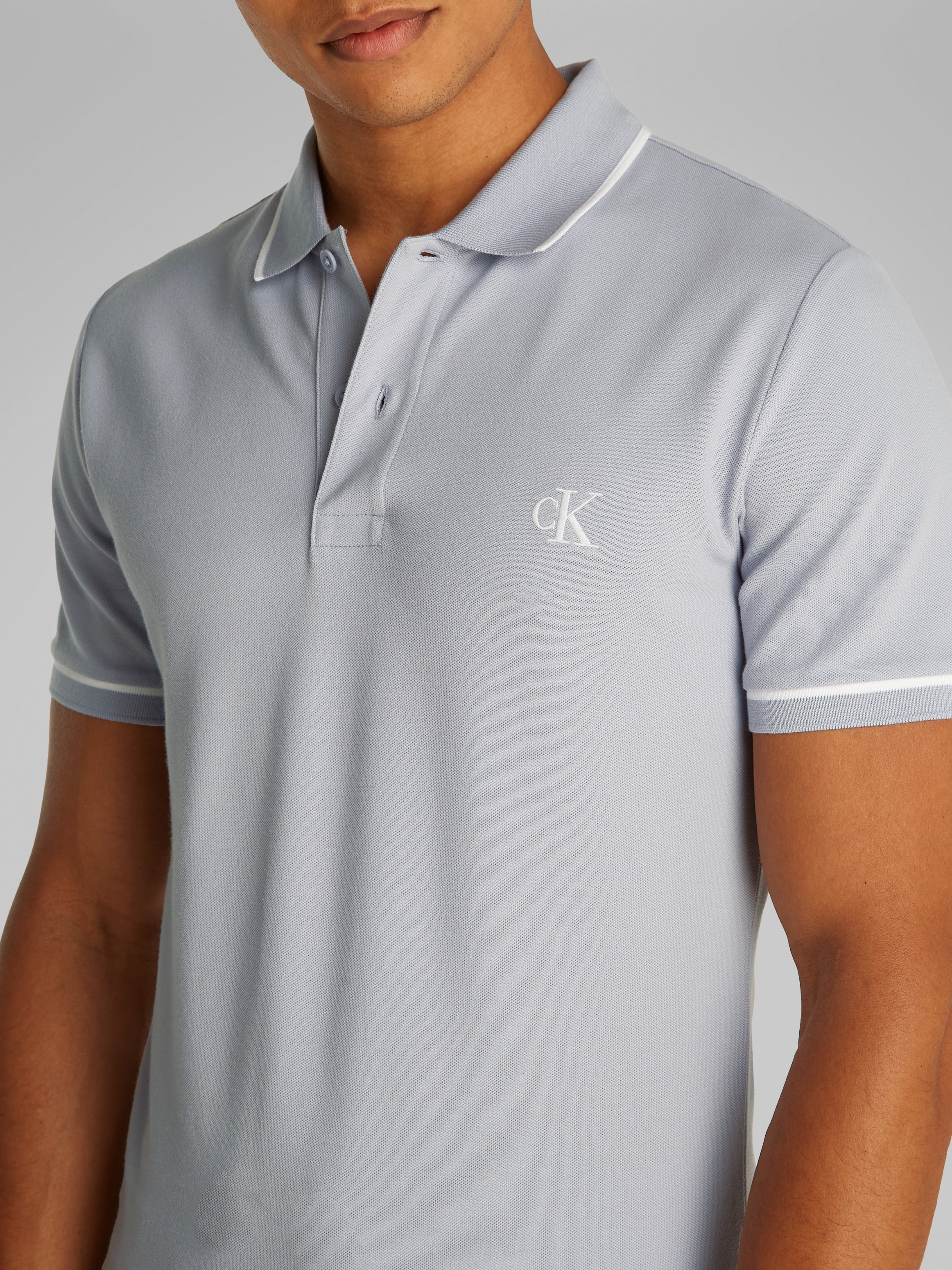 Calvin Klein Jeans Poloshirt »TIPPING SLIM POLO«, mit Streifendetail am Kragen