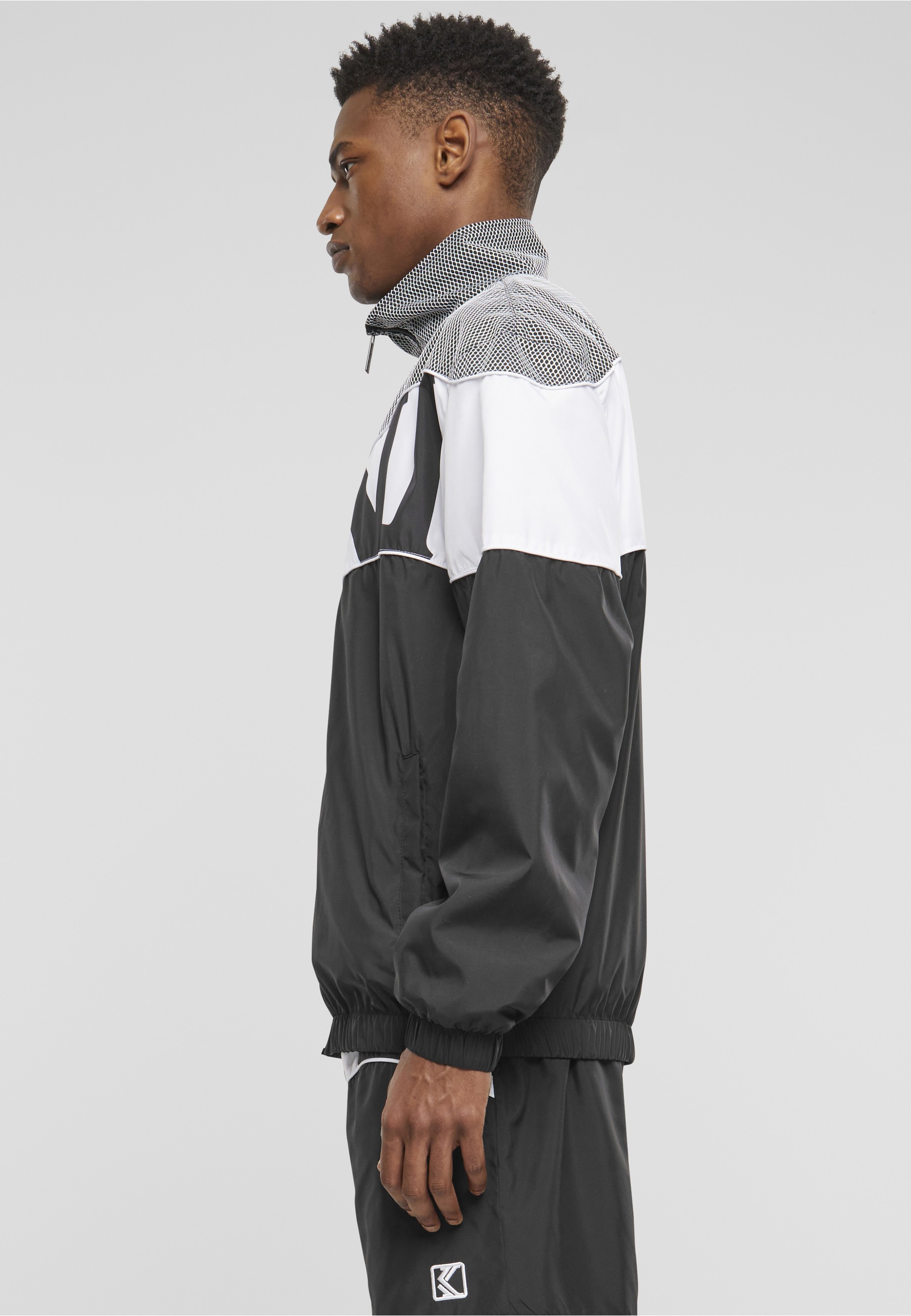 Karl Kani Trainingsjacke »Karl Kani Herren KM242-011-2 Wavy Retro Block Trackjacket« 1 Stk. tlg. ohne Kapuze