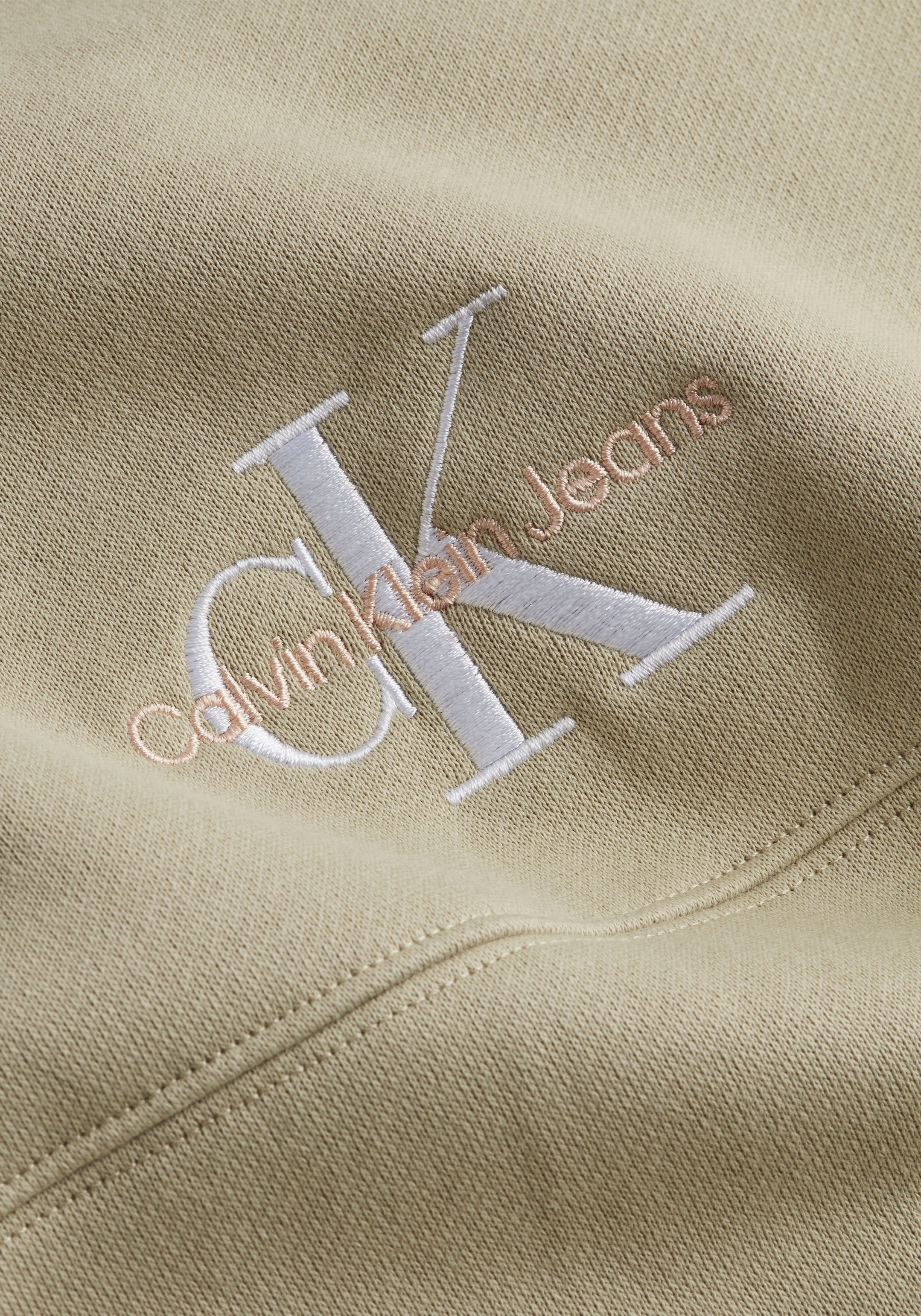 Calvin Klein Jeans Sweatshirt mit | NECK«, markanter für LOGO CREW »MONOGRAM kaufen BAUR Teilungsnaht