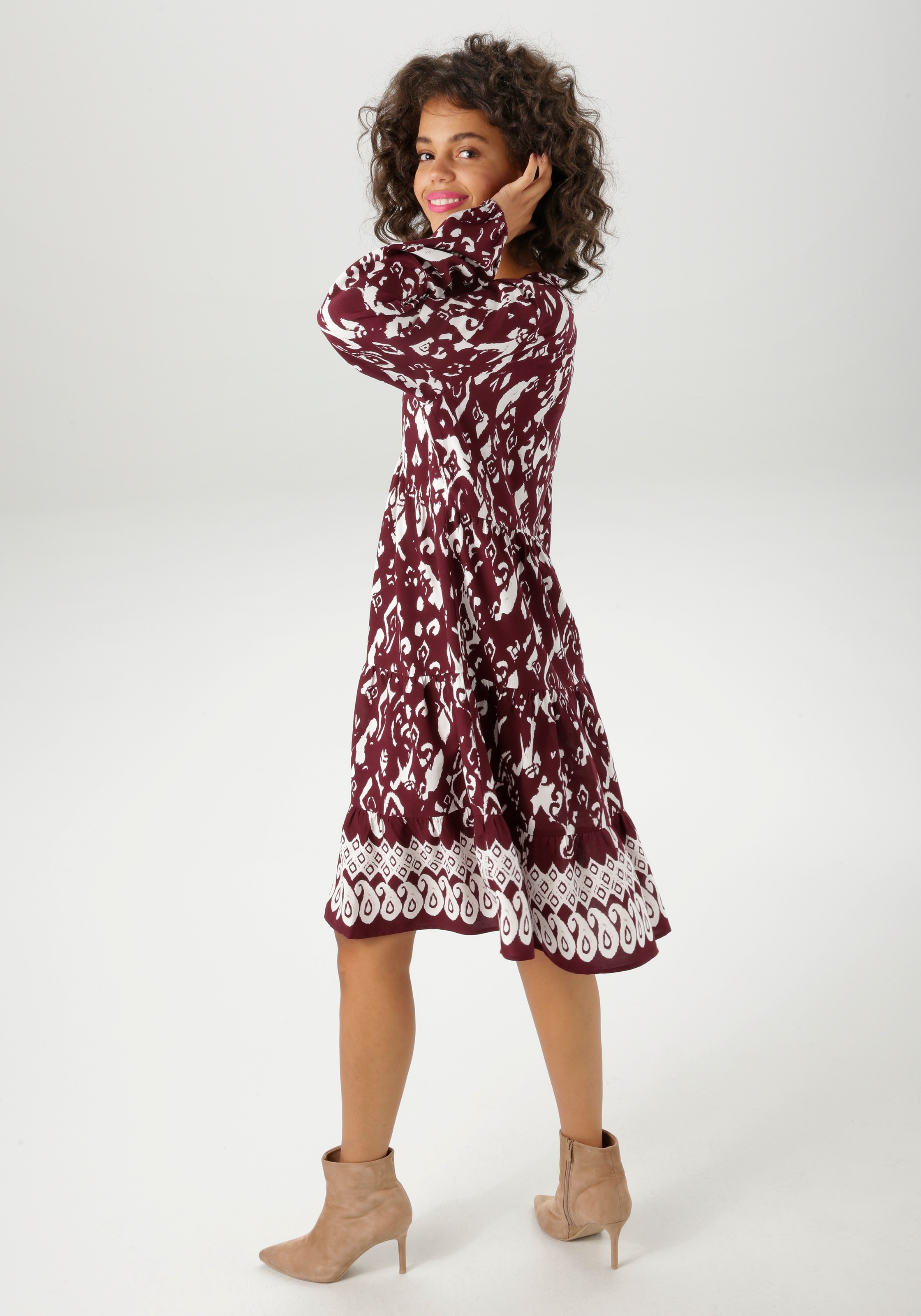 Aniston CASUAL Tunikakleid mit kunstvollem Druck und Bordüre am Saum günstig online kaufen