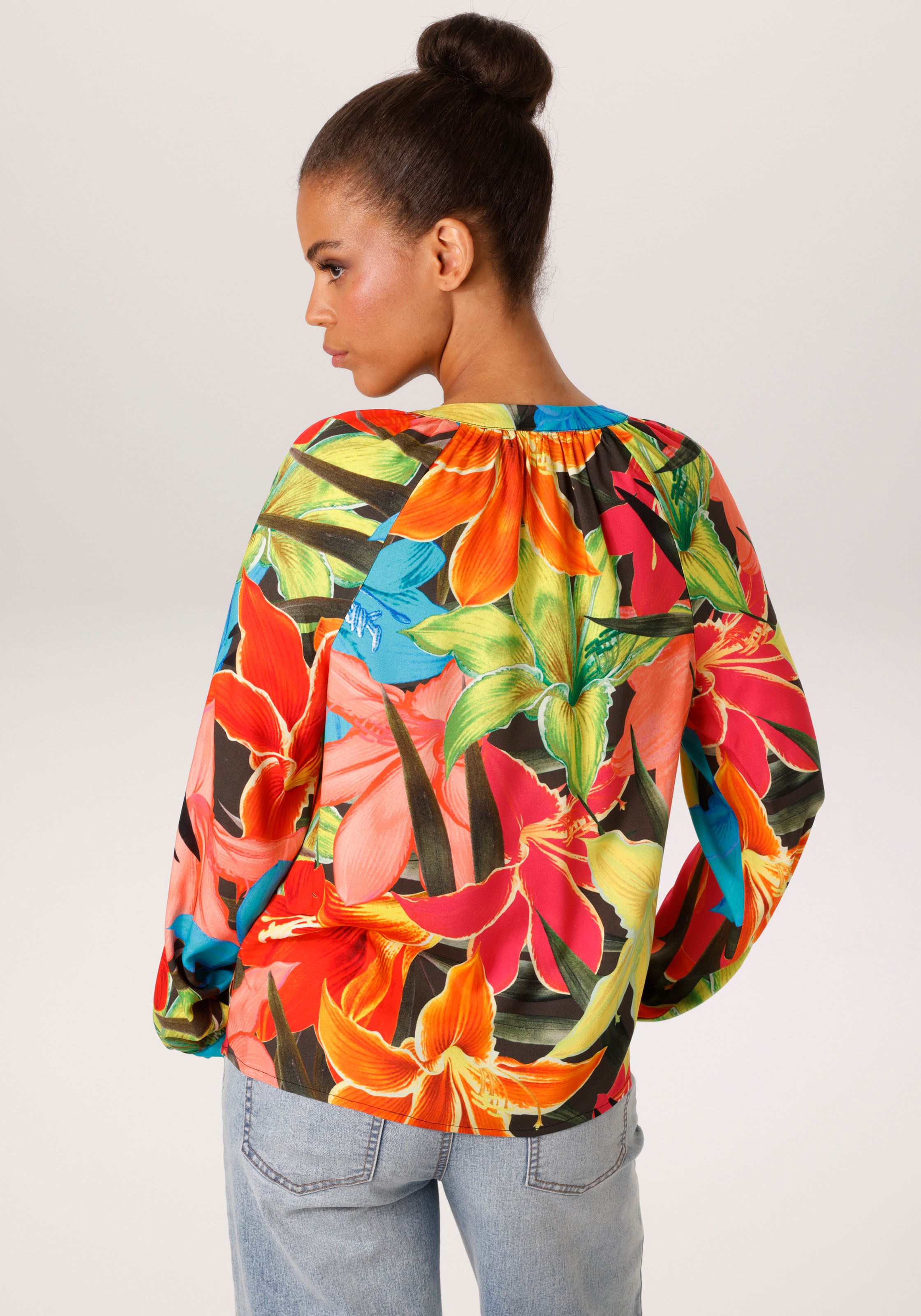 Aniston CASUAL Schlupfbluse mit farbenfrohen, großflächigen Blüten bedruckt günstig online kaufen