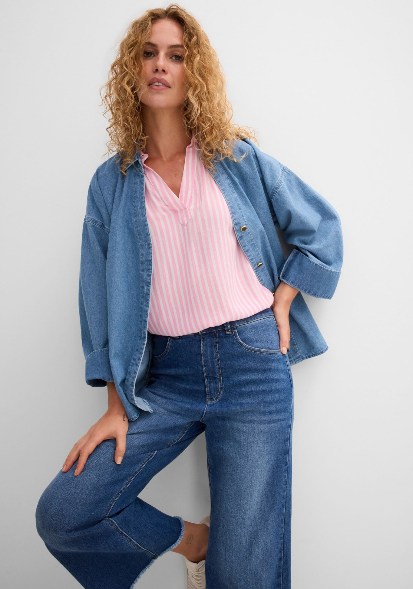 bonprix Kurzarmbluse »Kurzarmbluse aus fließender Viskose« Loose Fit, für einen luftigen Look, aus Viskose, gestreift