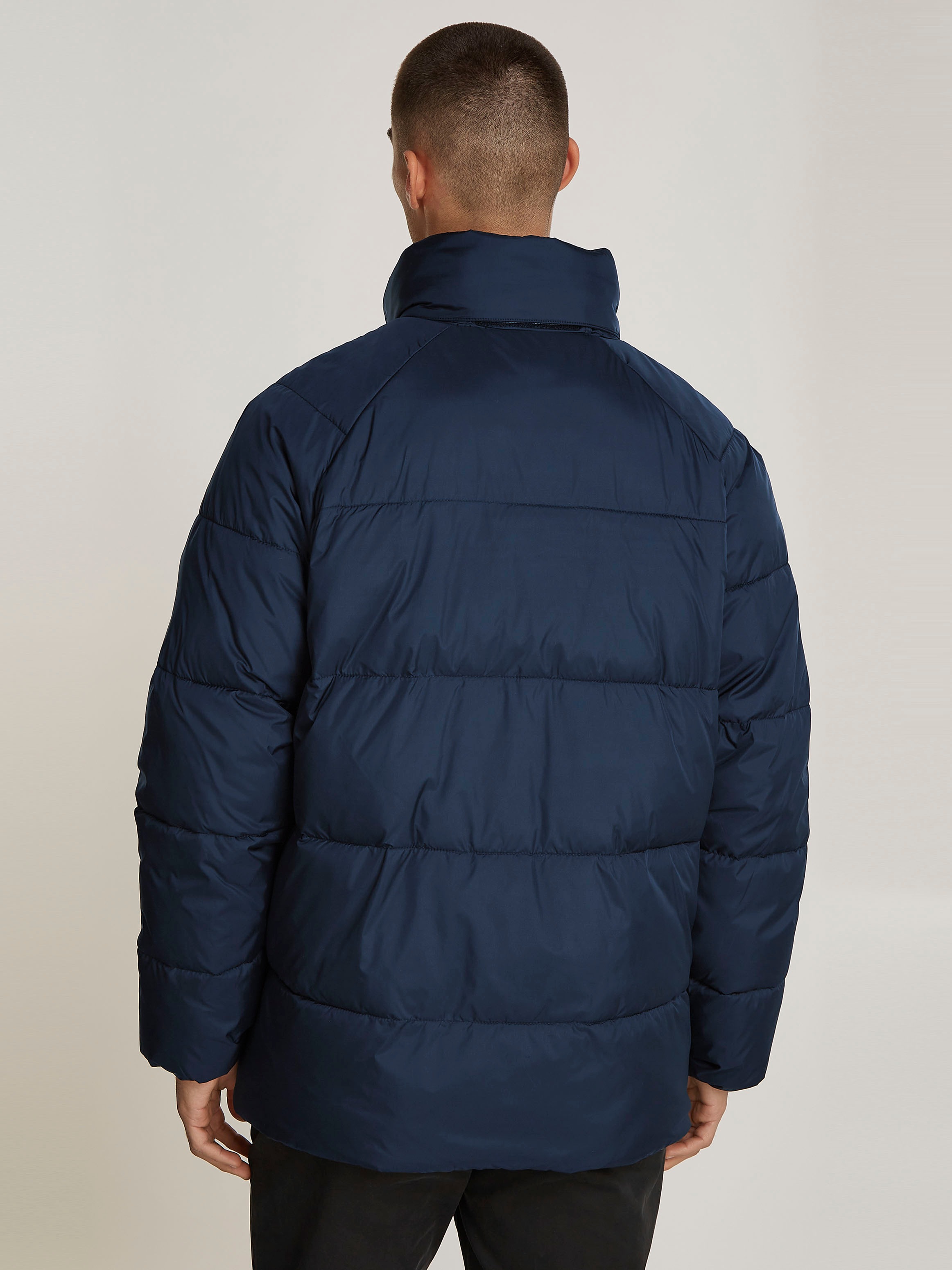 Tommy Jeans Steppjacke "TJM POLY PUFFER EXT" ohne Kapuze Winterjacke mit St günstig online kaufen