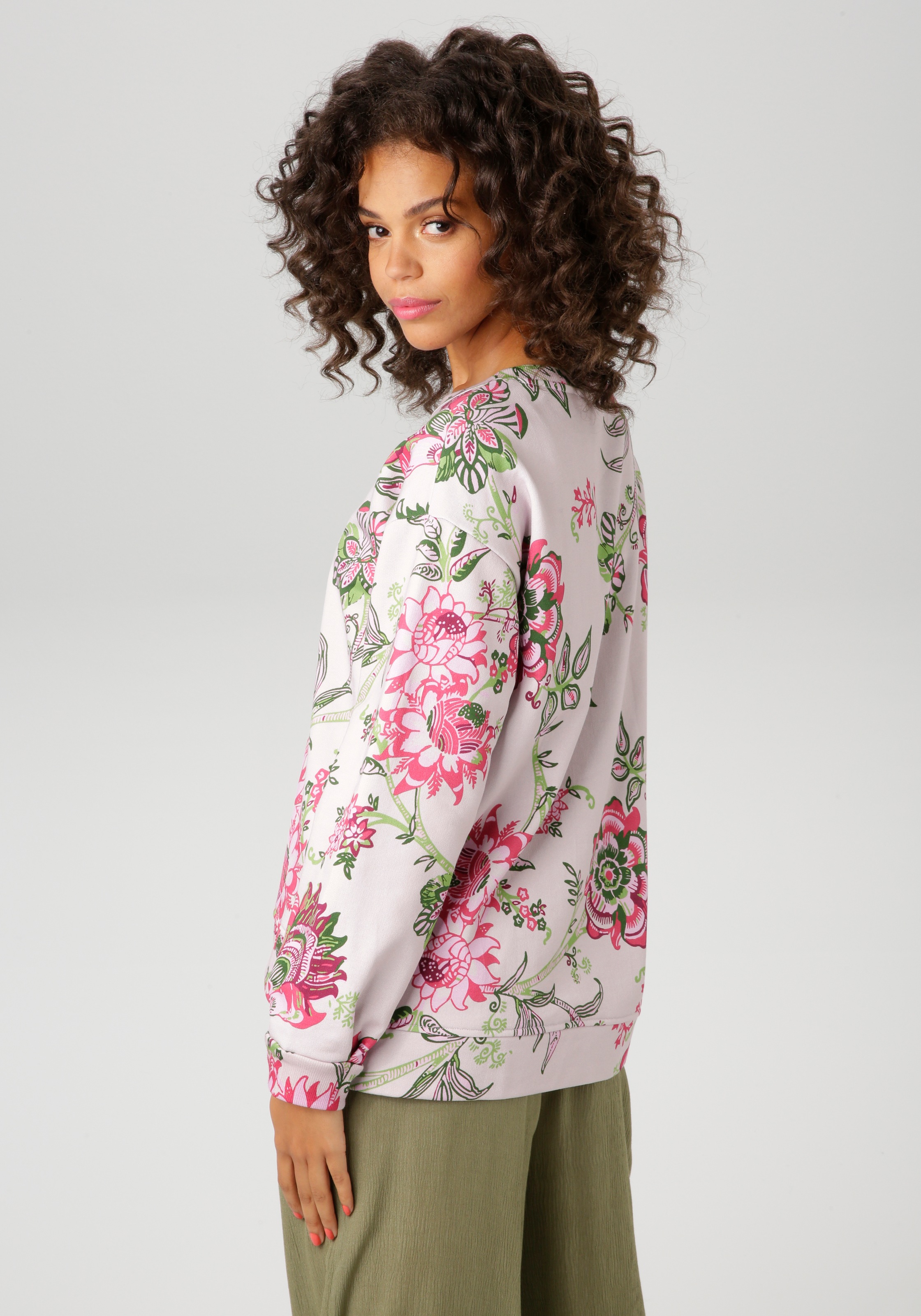 Aniston CASUAL Sweatshirt, im extravaganten Blumendruck mit Folienprint günstig online kaufen