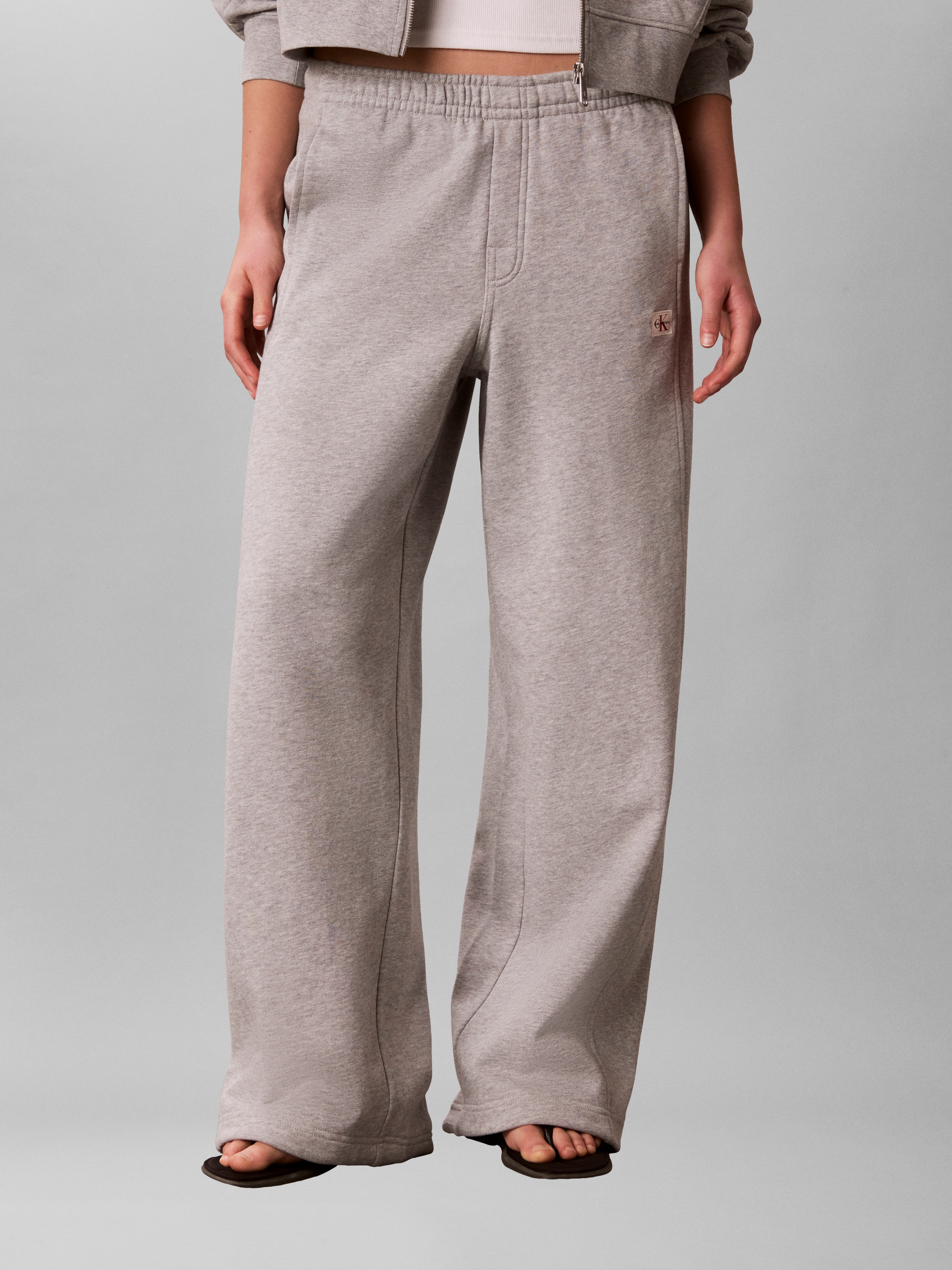 Calvin Klein Jeans Sweathose "A- FRENCH TERRY BADGE LOGO PANT" mit weitem Bein