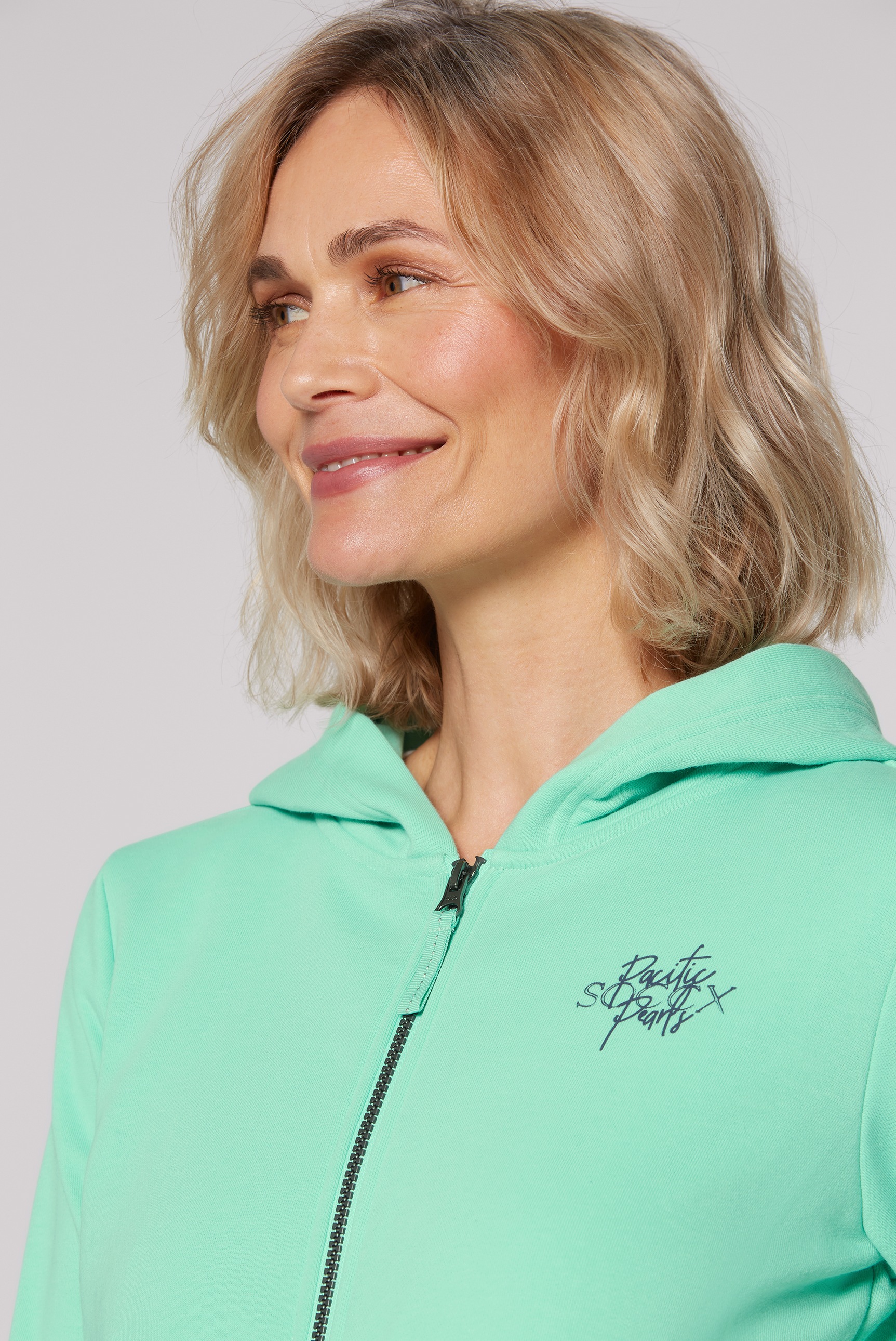 SOCCX Kapuzensweatjacke, mit Rücken-Print