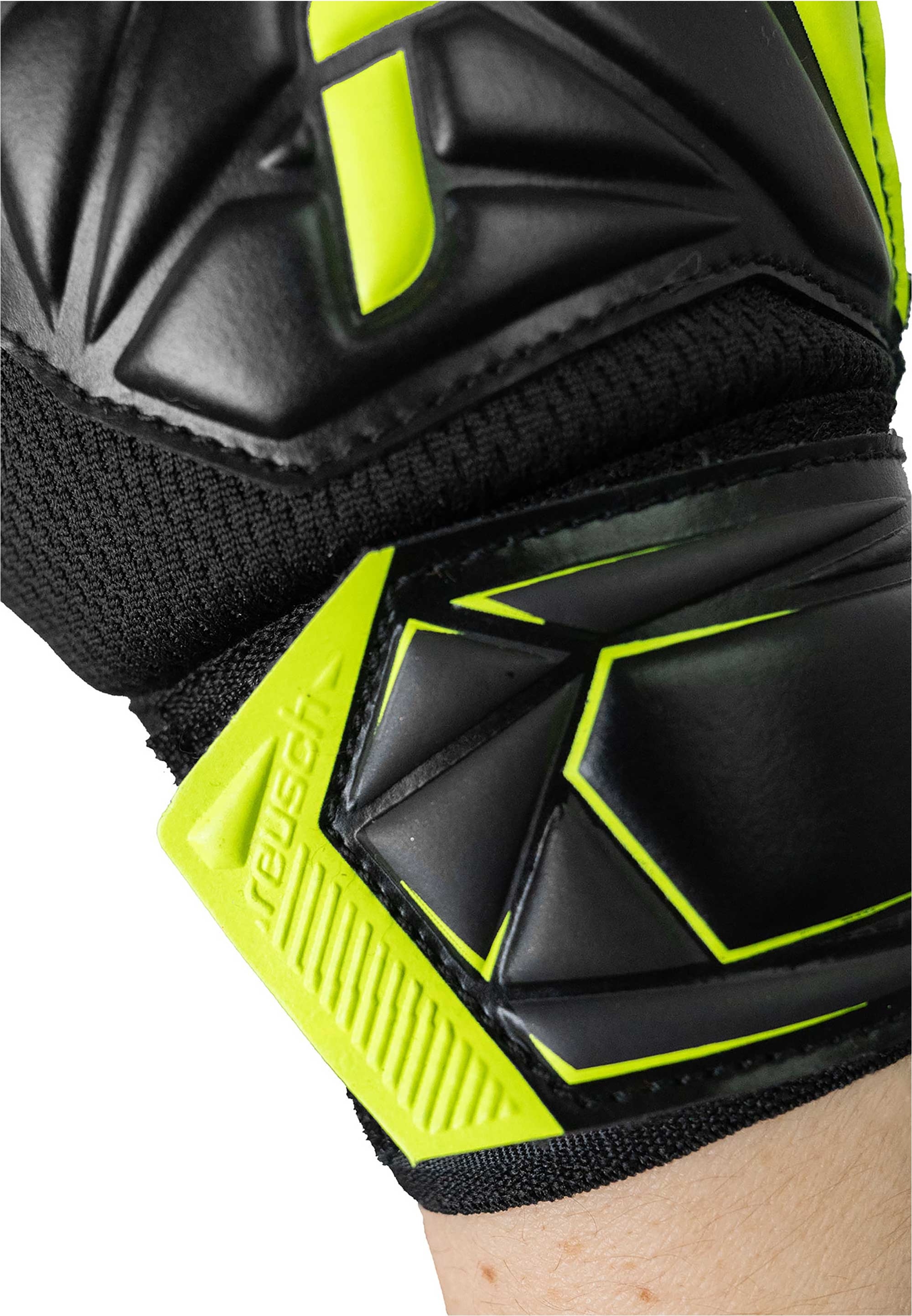 Reusch Torwarthandschuhe »Attrakt Starter Solid Finger Support Junior« mit integriertem Fingersupport-System