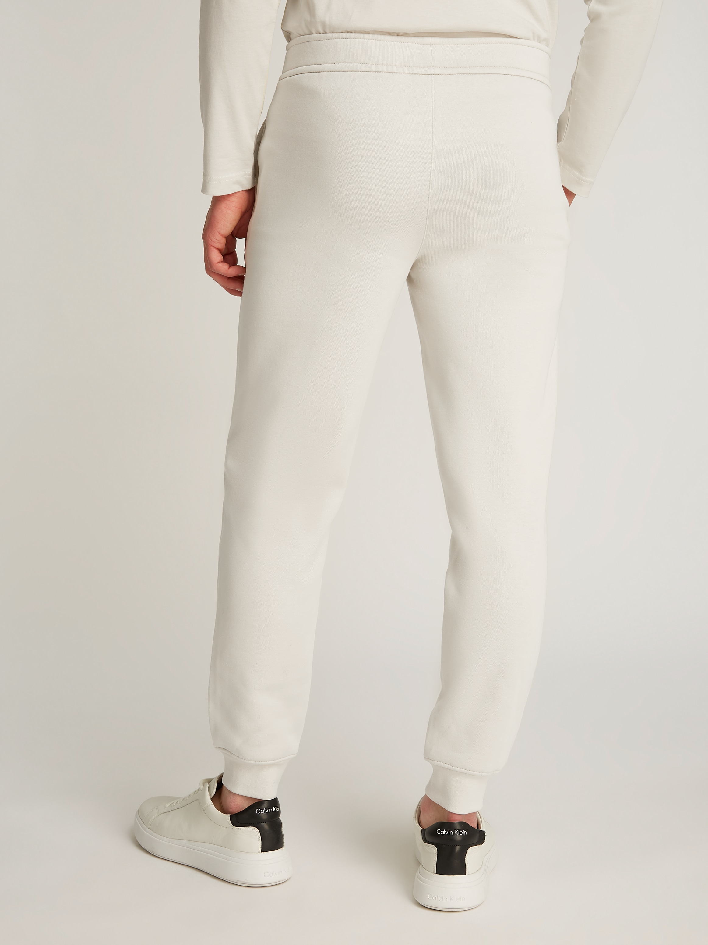 Calvin Klein Jogger Pants »HORIZONTAL LOGO SWEATPANTS«, mit Logoschriftzug